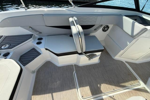 Interior of 2022 Sea Ray SPX 210 Outboard boat with modern seating and sleek design.