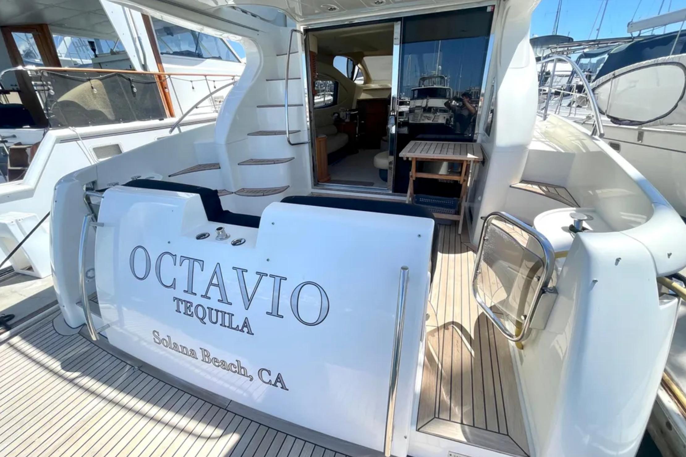 2004 Azimut 46 yacht with "Octavio Tequila" branding, docked at Solana Beach, CA.