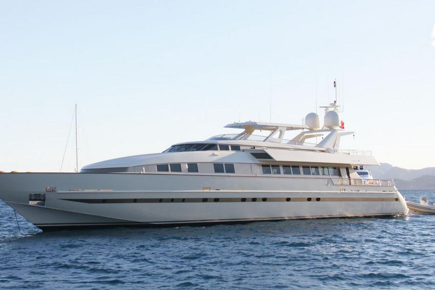 Luxury 1990 Baglietto RPH yacht cruising on open water.