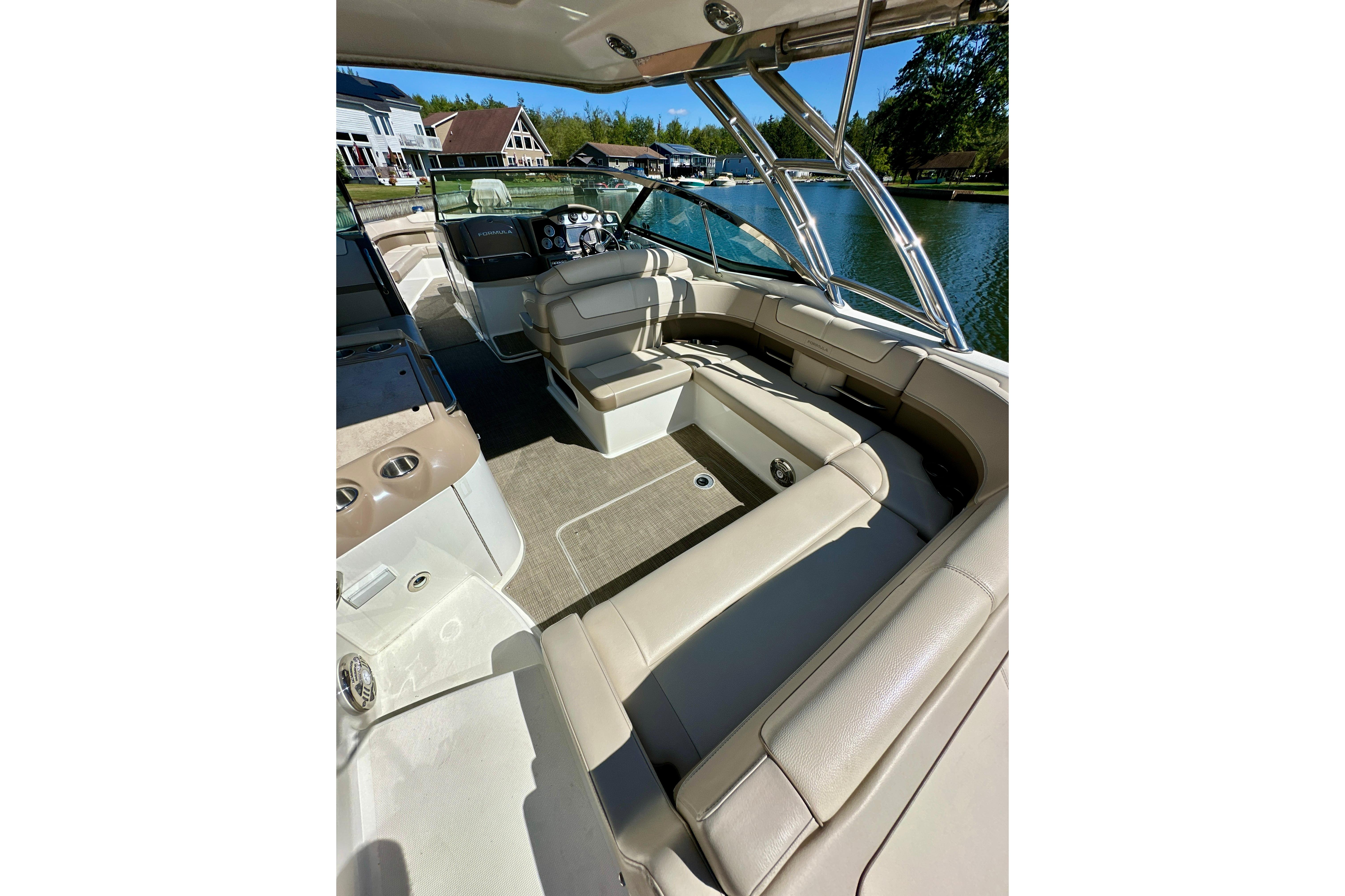 2015 Formula 350 Crossover Bowrider I/O interior with luxurious seating and sleek design.