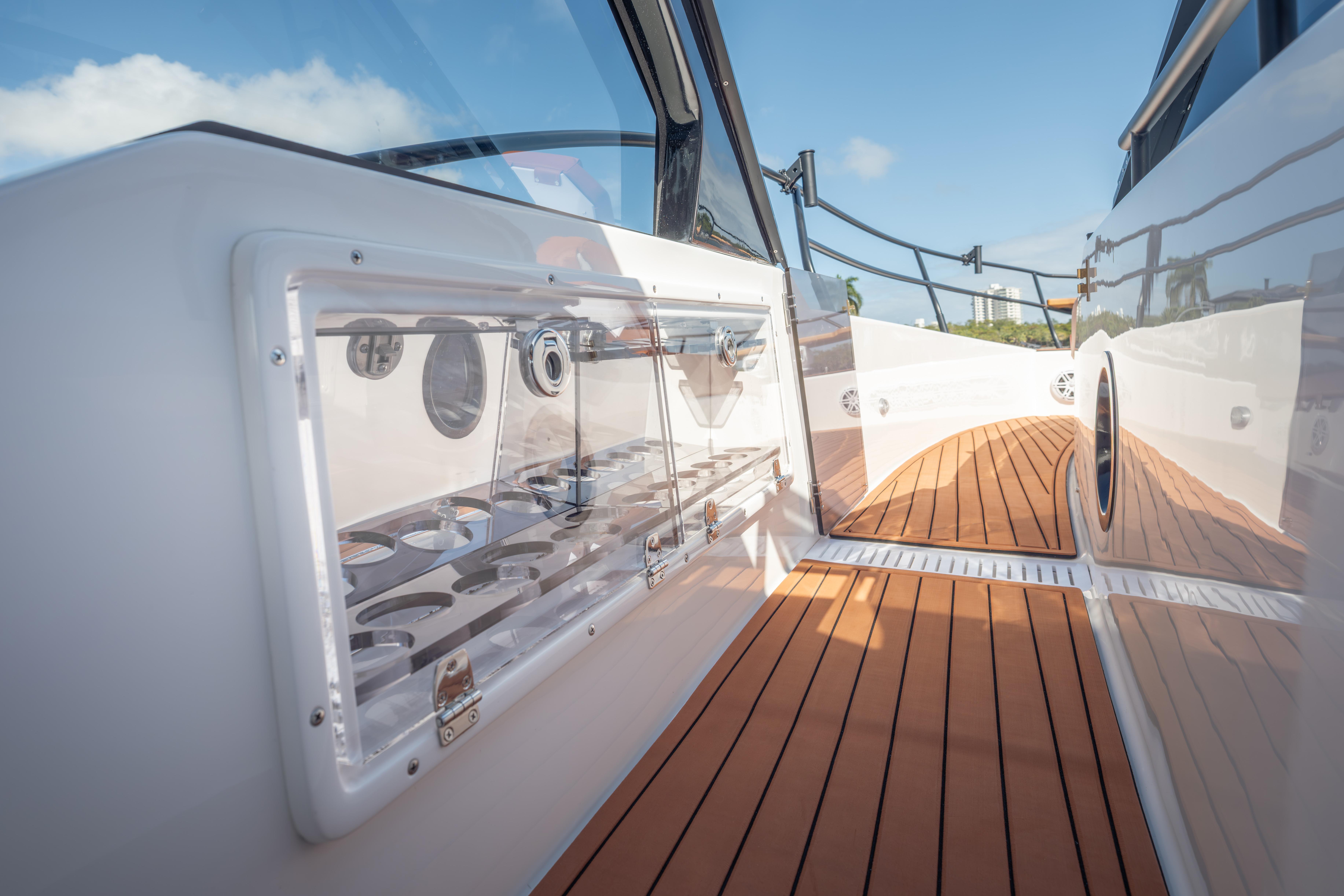 Modern Hanover 387 yacht deck with sleek design and wood flooring, 2026 model.