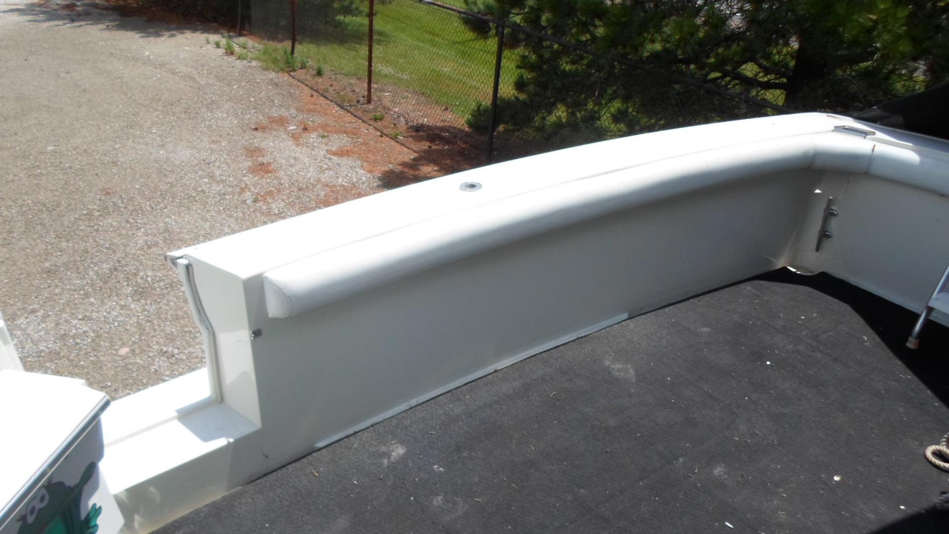 1993 Silverton 37 Convertible boat deck, white, outdoor setting.