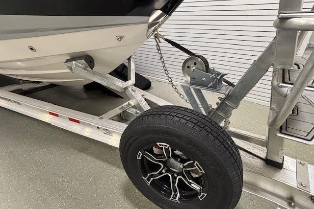 2026 Chaparral SSX 8 boat on trailer with black wheel and winch system.