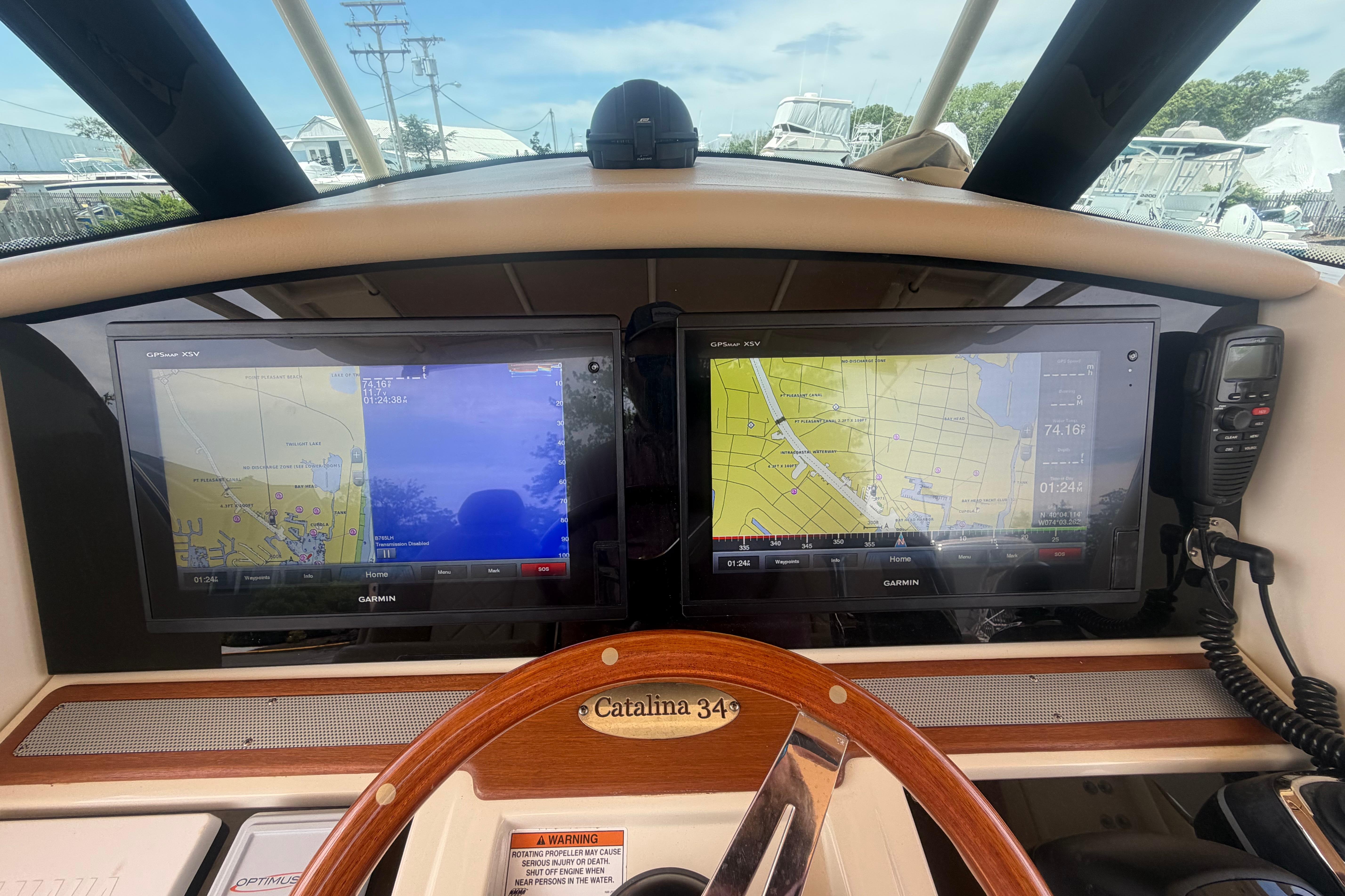 Dashboard of a 2017 Chris-Craft Catalina 34 with dual Garmin navigation screens.