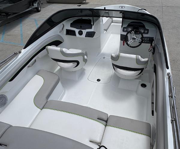 2019 Tahoe 700 boat interior with white seating and modern dashboard design.