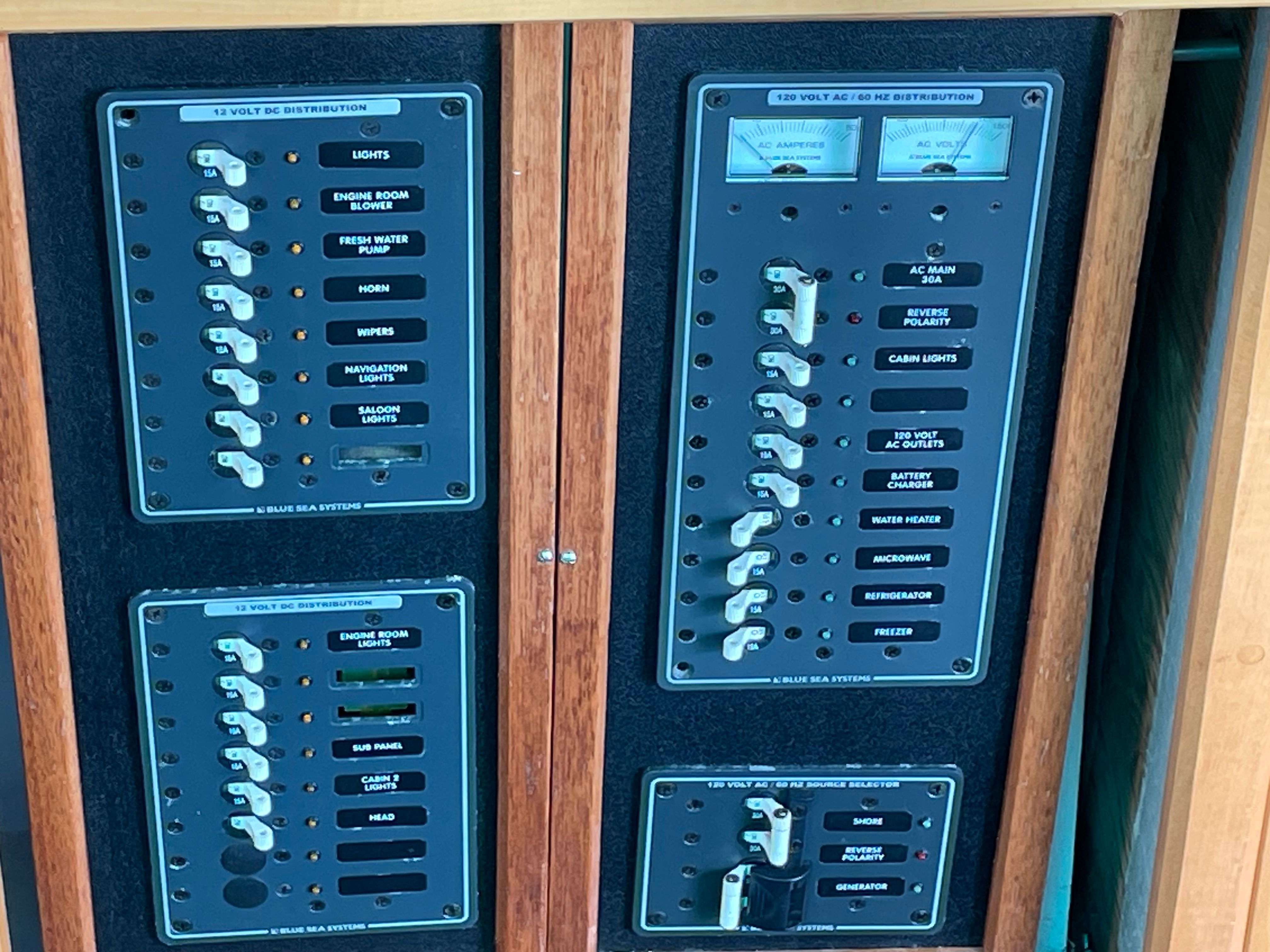 1969 Bertram Caribe control panel with electrical distribution.