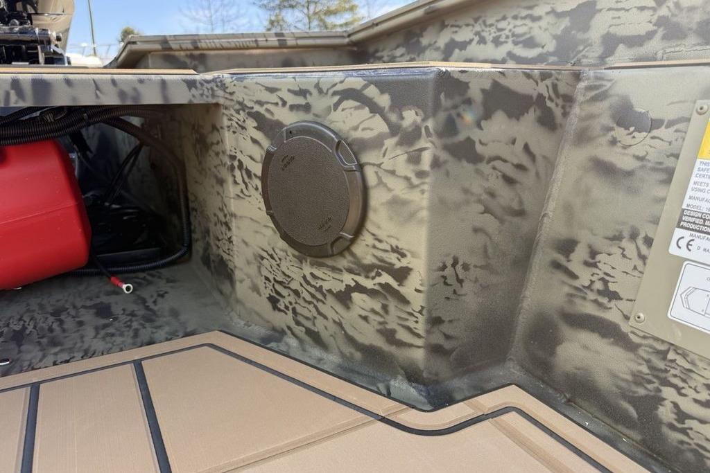 2026 Tracker Grizzly 1650 T Prairie Wings Edition interior with camouflage design.
