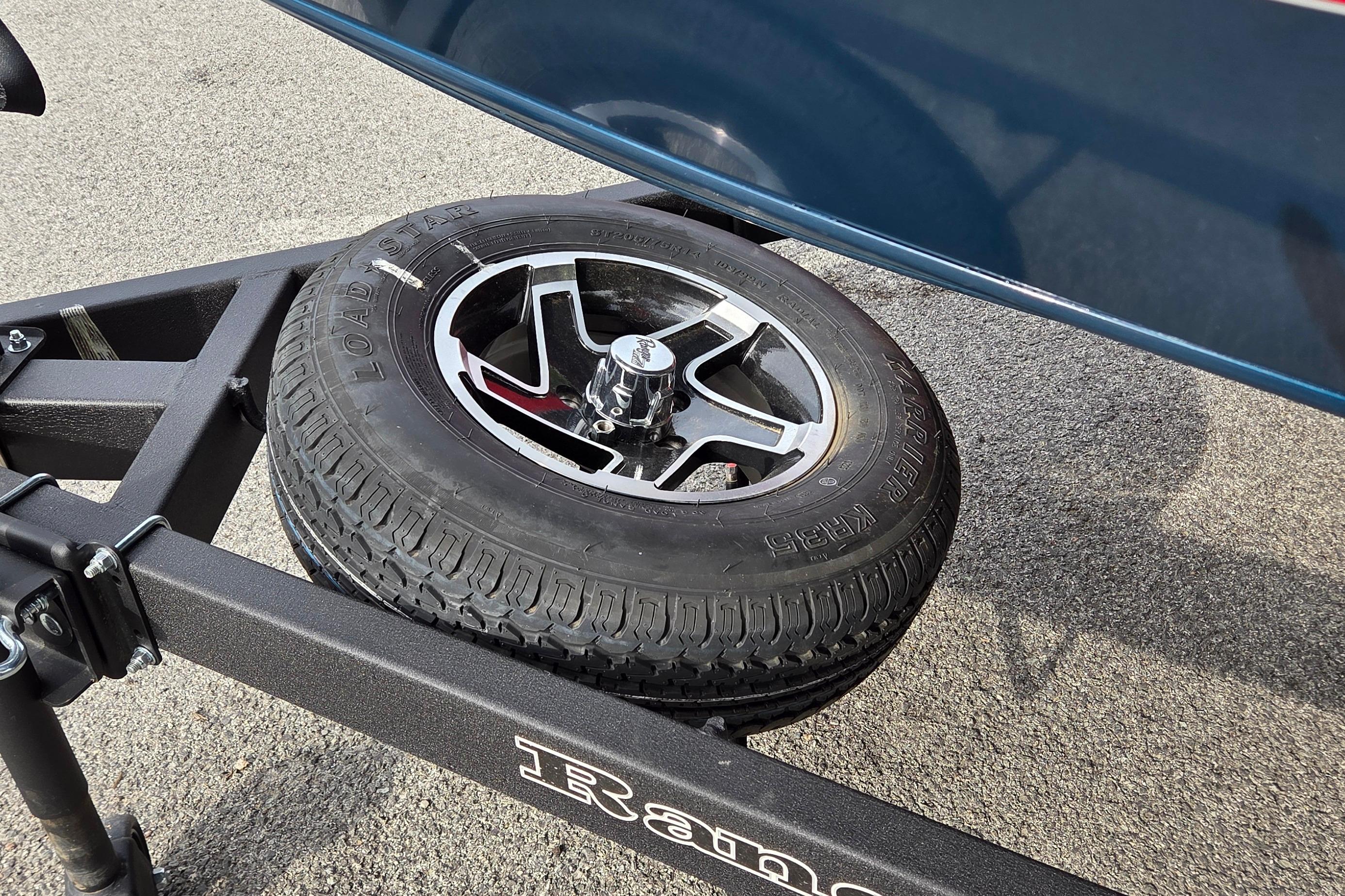 2026 Ranger VS1782SC Reata trailer with spare tire on asphalt.