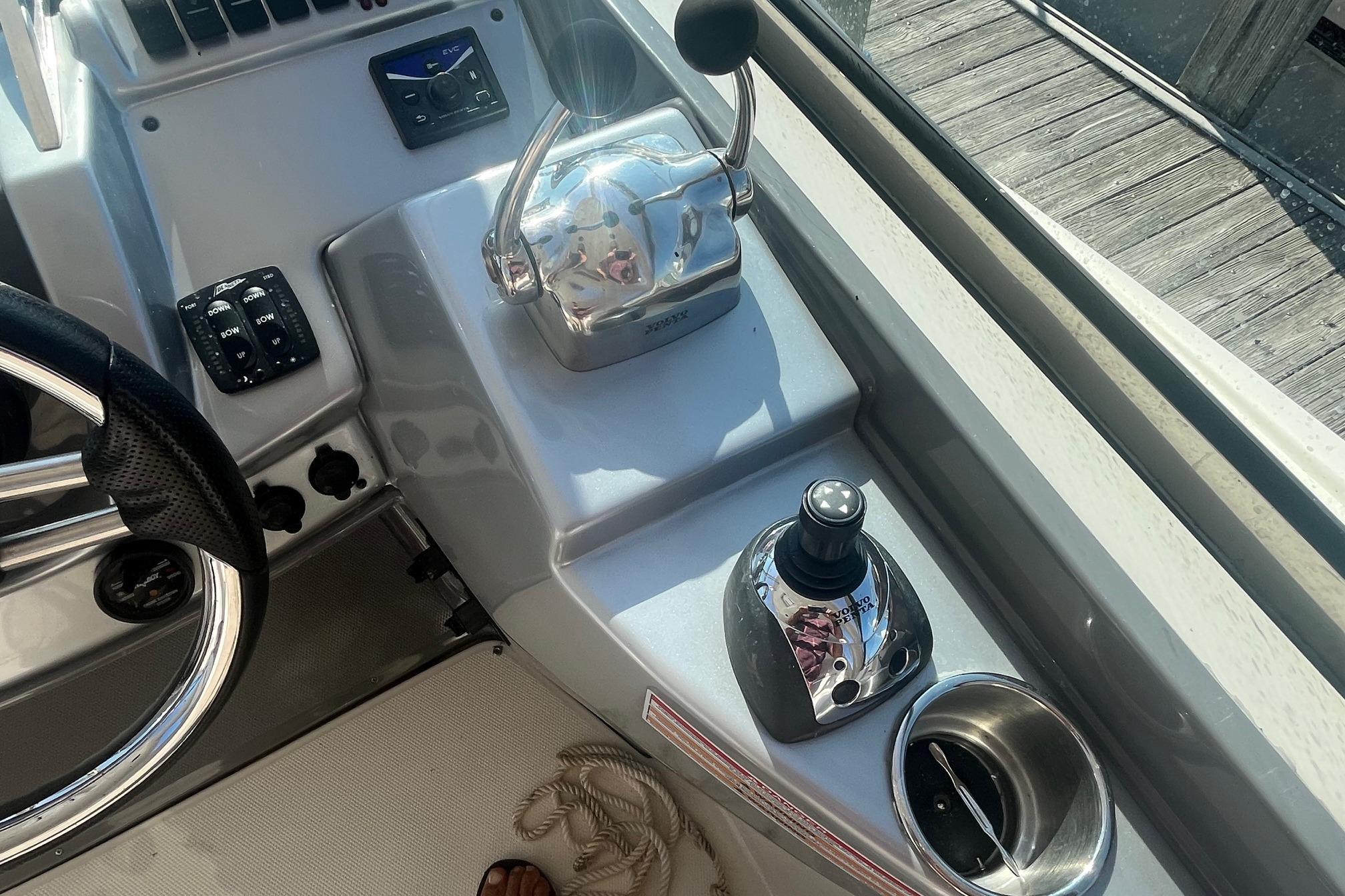 2010 Monterey 400 Sport Yacht helm with controls and steering wheel.