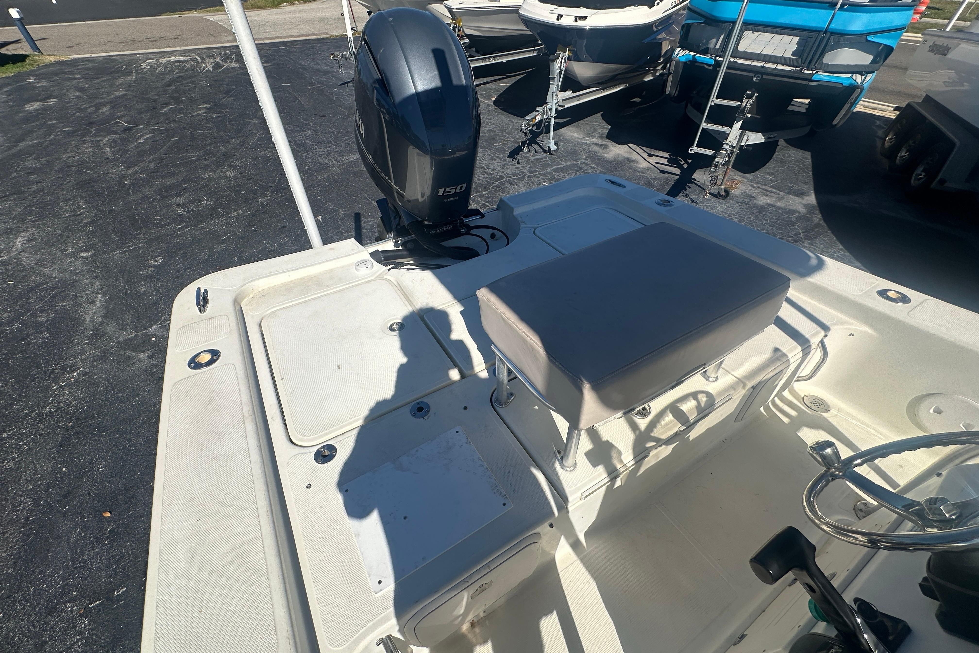 2003 Hydra-Sports 19 Bay Bolt boat interior with seating and outboard motor.