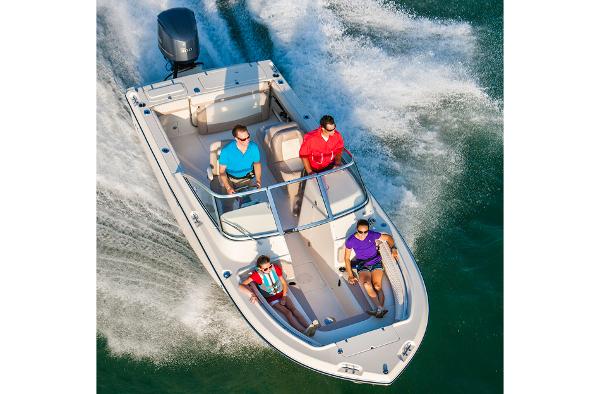 Manufacturer Provided Image: 2015 Grady-White Freedom 225 boat cruising with passengers on a sunny day.