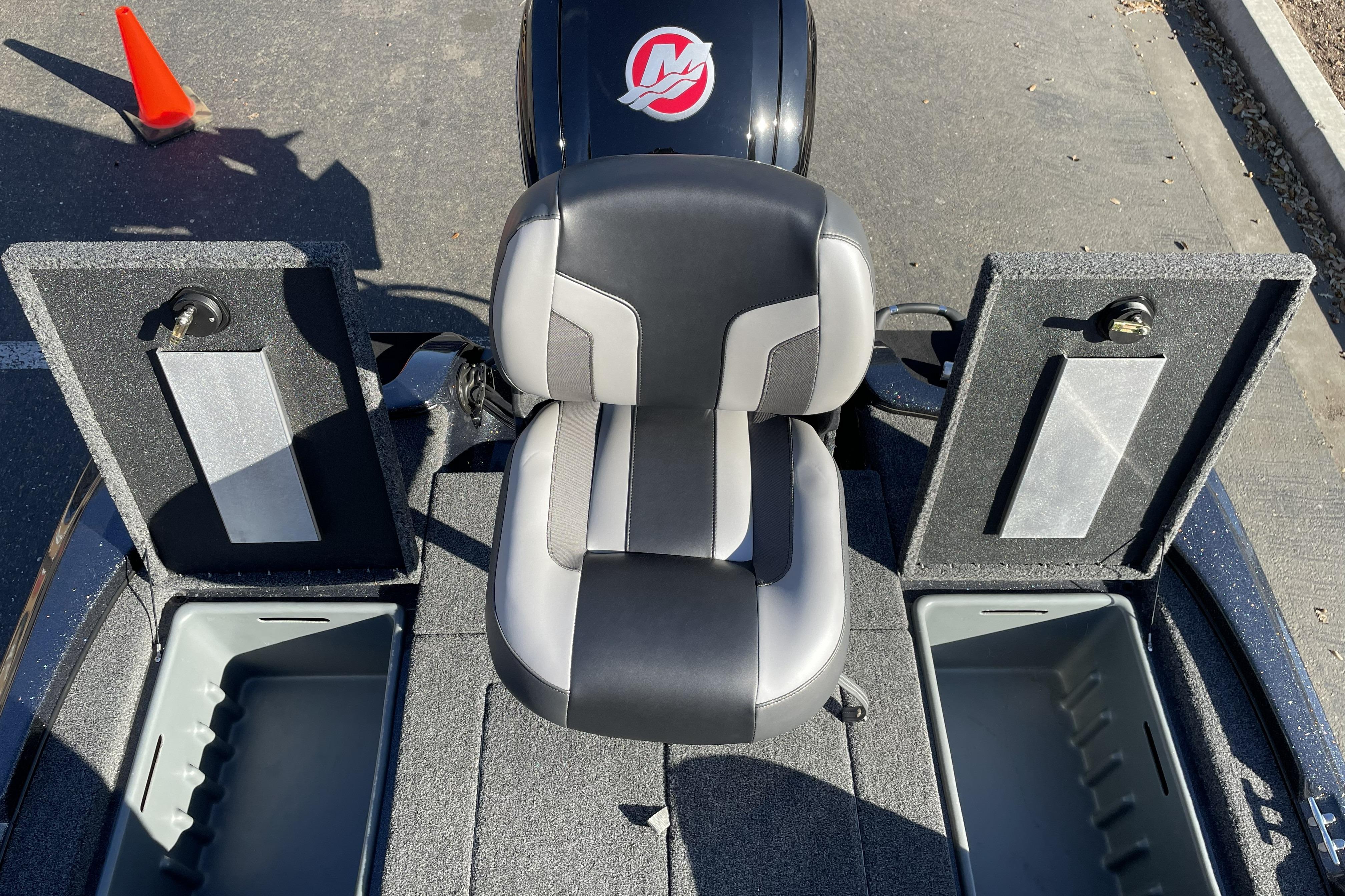 2026 Nitro Z17 boat interior with storage compartments and cushioned seat.