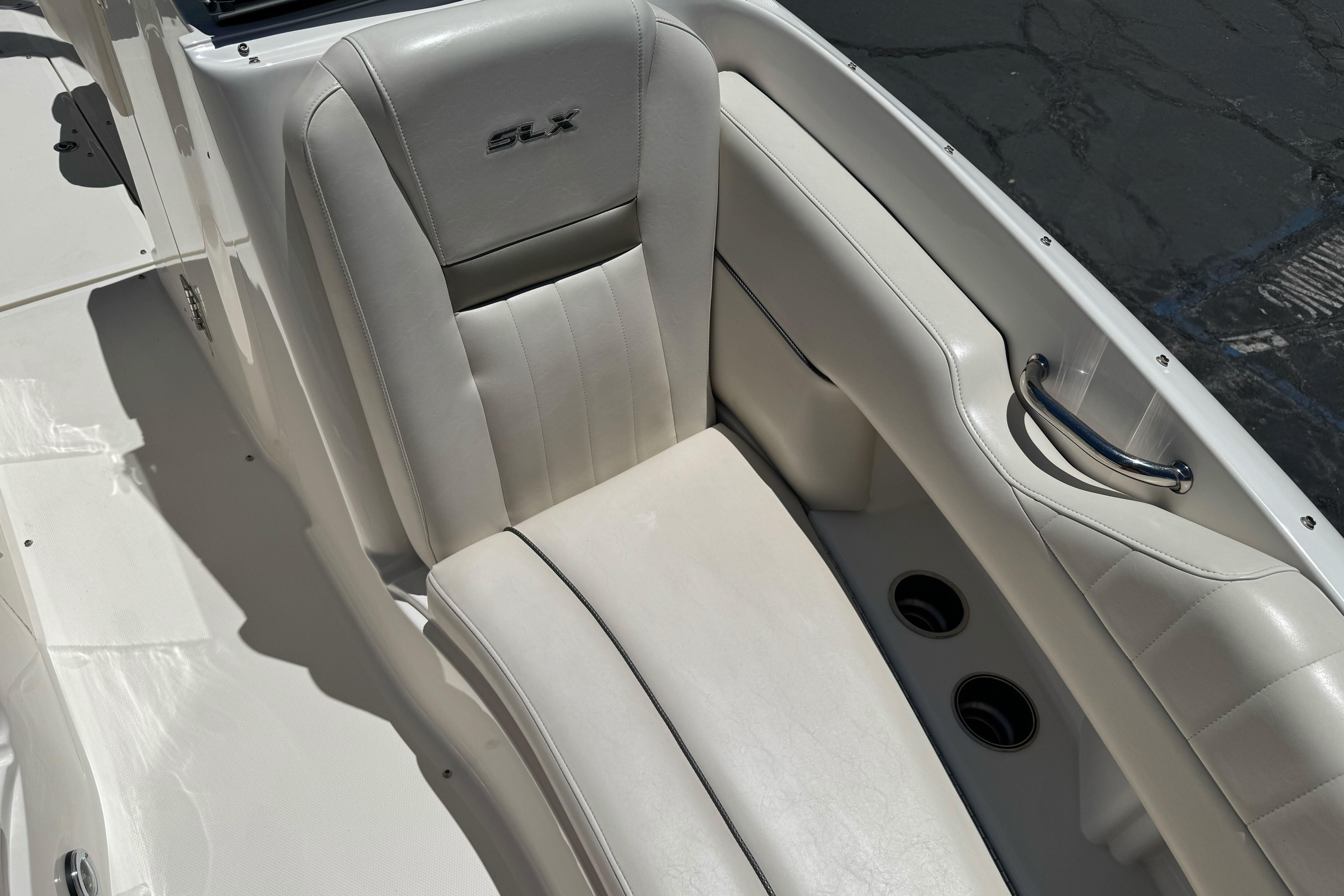 Luxurious white seating on a 2007 Sea Ray SLX 250 boat.