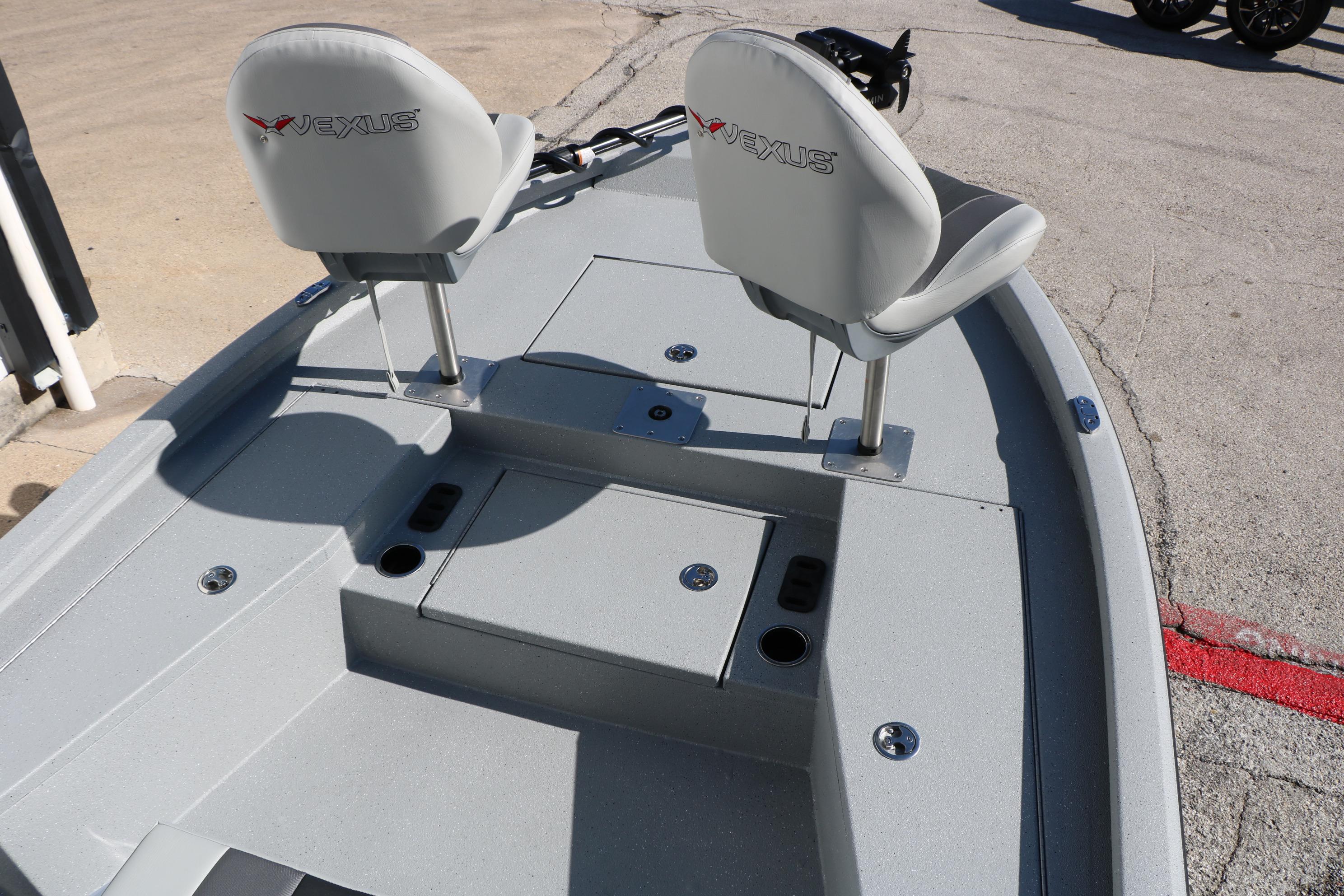 2026 Vexus ACX2000 boat interior with dual seats and storage compartments.