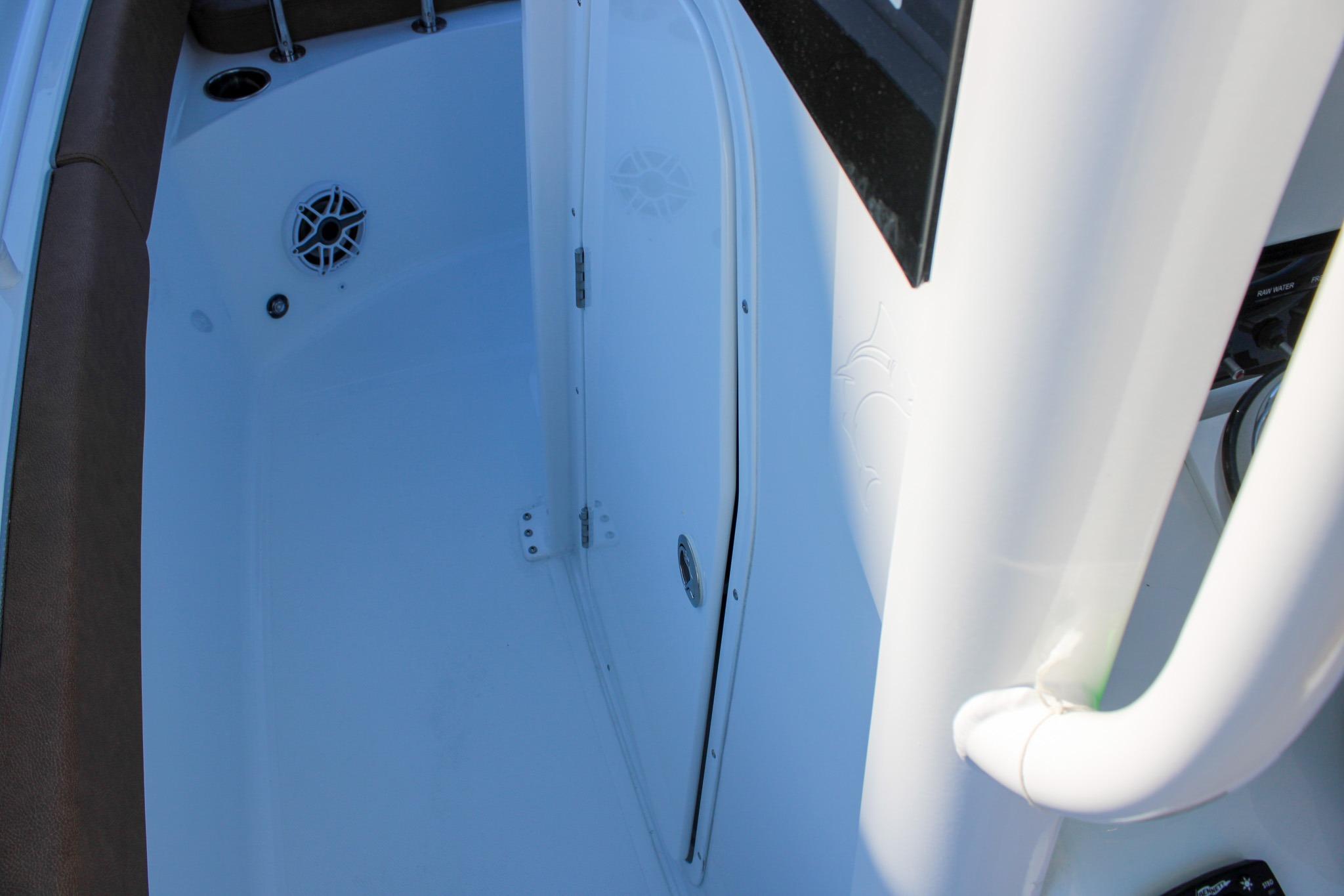 2026 Sea Hunt Gamefish 25 interior with white finish and speaker detail.