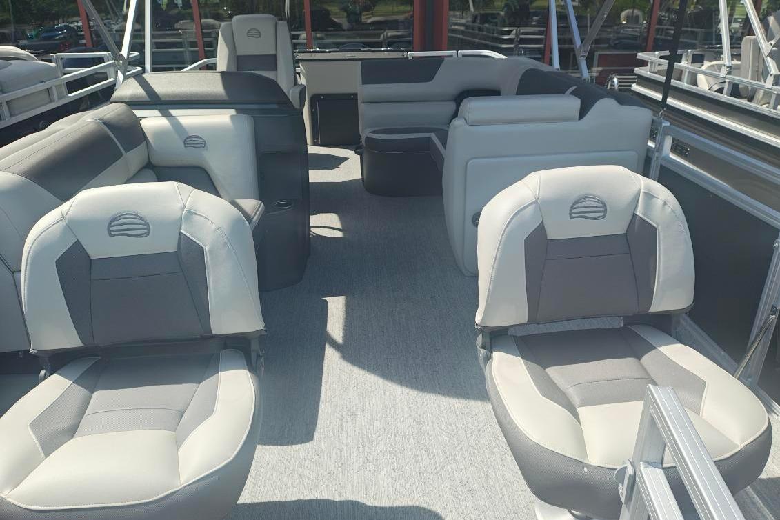 2026 Sun Tracker Fishin' Barge 20 DLX interior with comfortable seating and spacious layout.