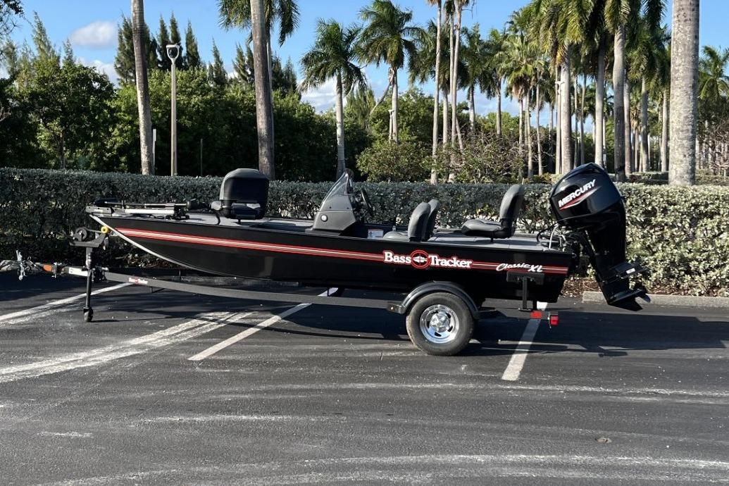 2026 Tracker Bass Tracker Classic XL boat on trailer, parked outdoors.