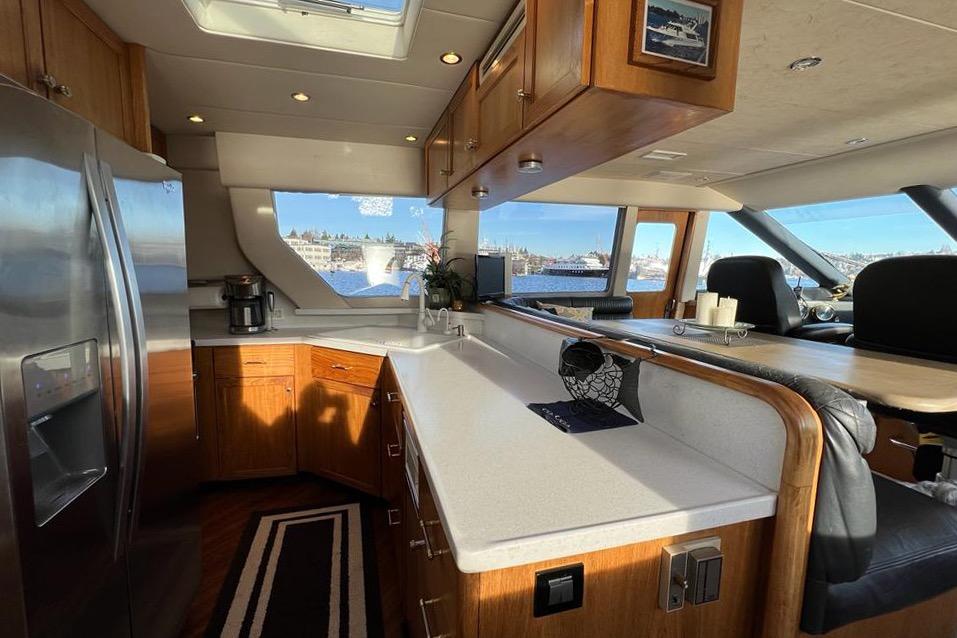 Luxurious kitchen interior of 1999 Pacific Mariner 65 Motoryacht with modern amenities.