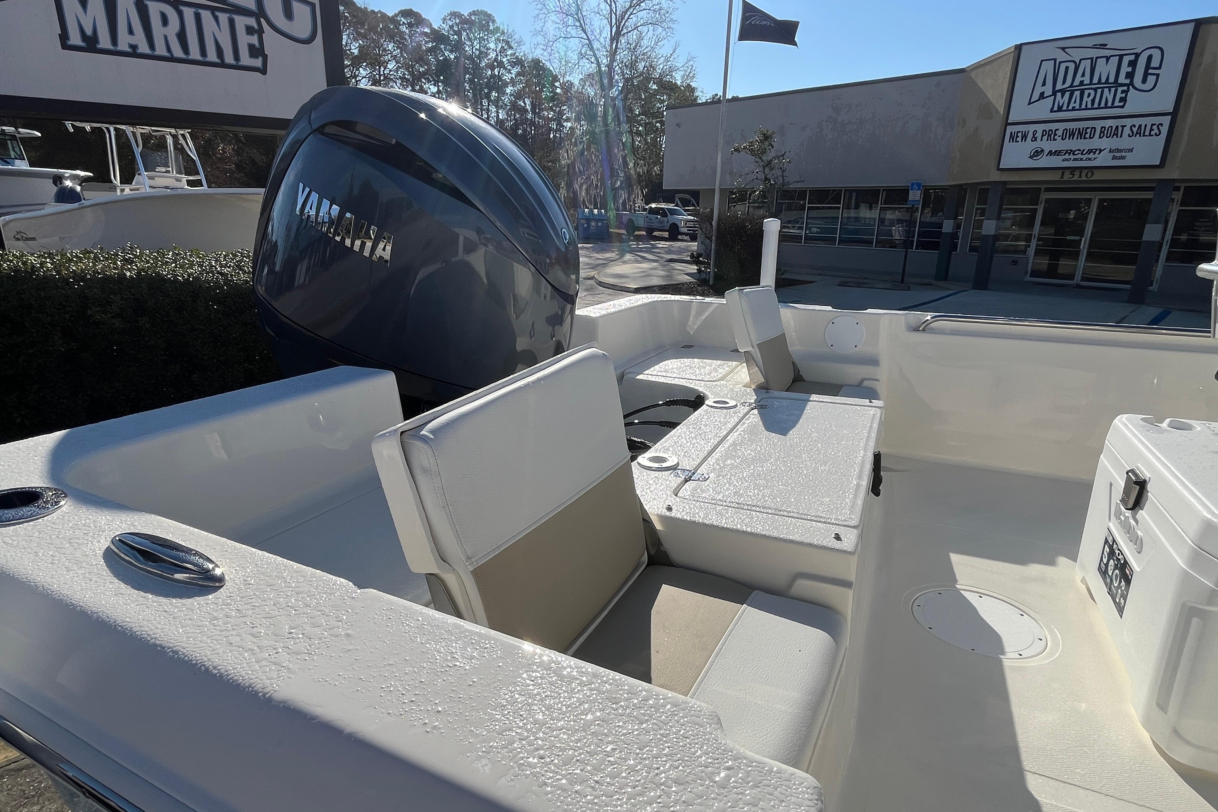 2026 Bulls Bay 2200 boat interior with Yamaha engine at marine dealership.