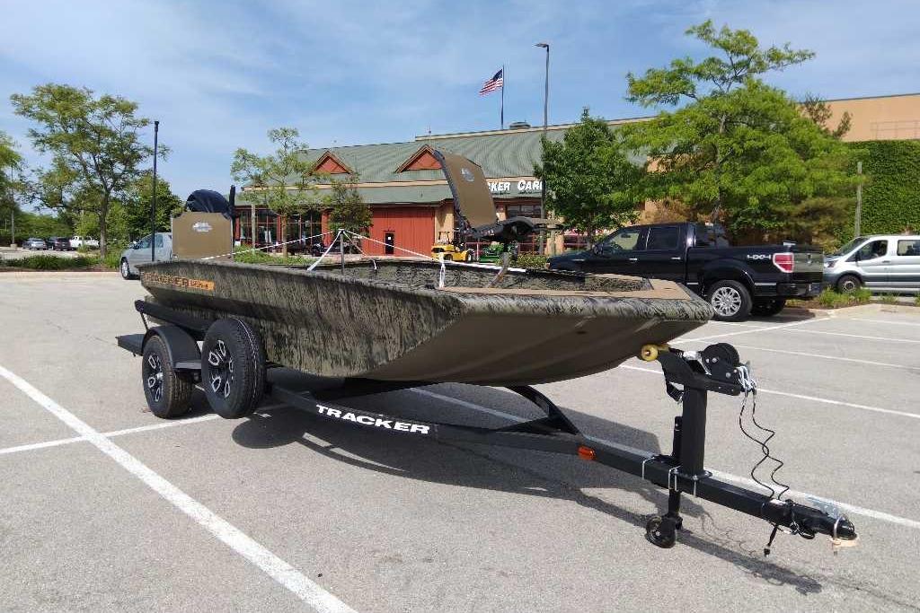 2026 Tracker Grizzly 1756 T Marsh boat on trailer in parking lot.