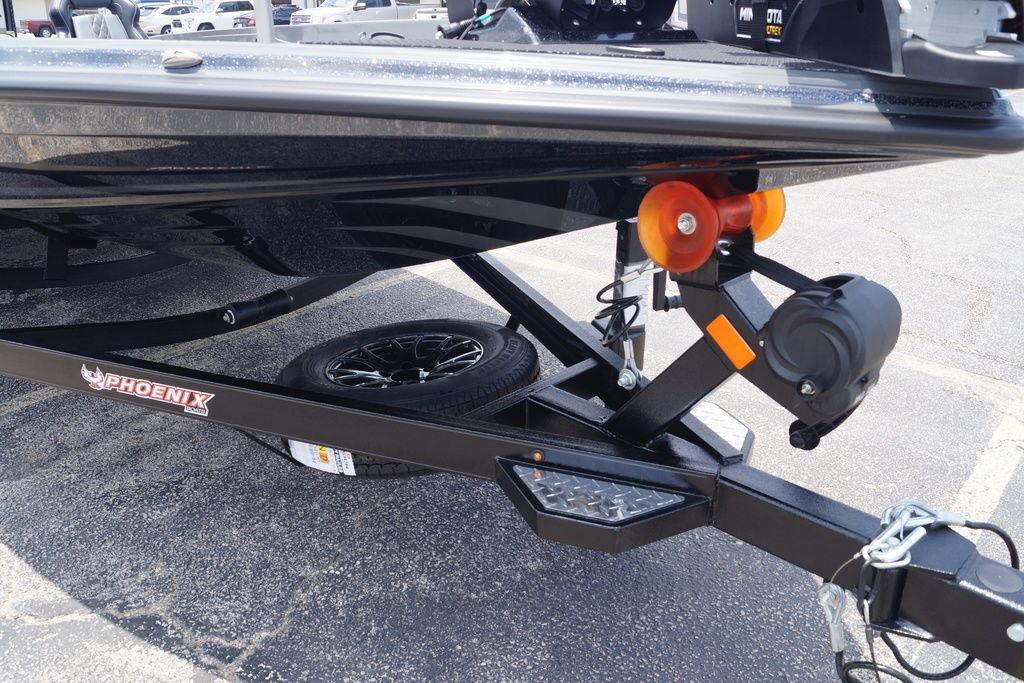 2027 Phoenix 921 Elite X II boat trailer with black frame and orange rollers.