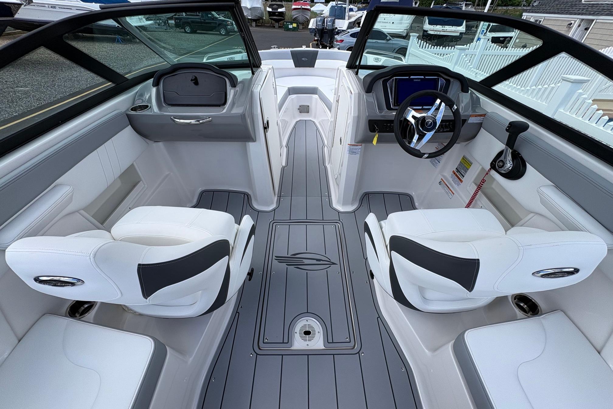 Interior of 2026 Chaparral 23 SSi OB boat with modern seating and controls.