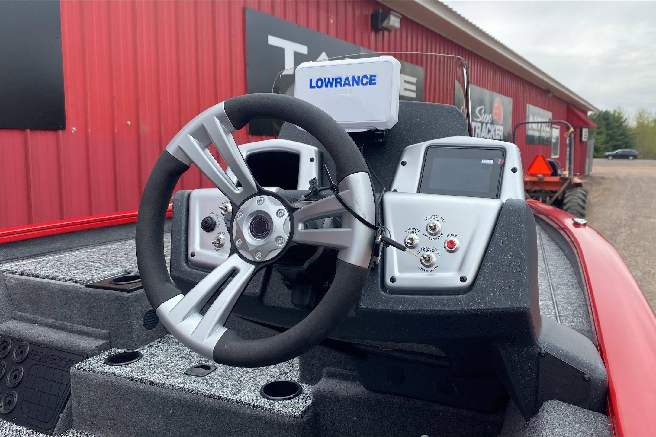 Steering console of 2026 Tracker Pro Team 195 boat with Lowrance electronics.