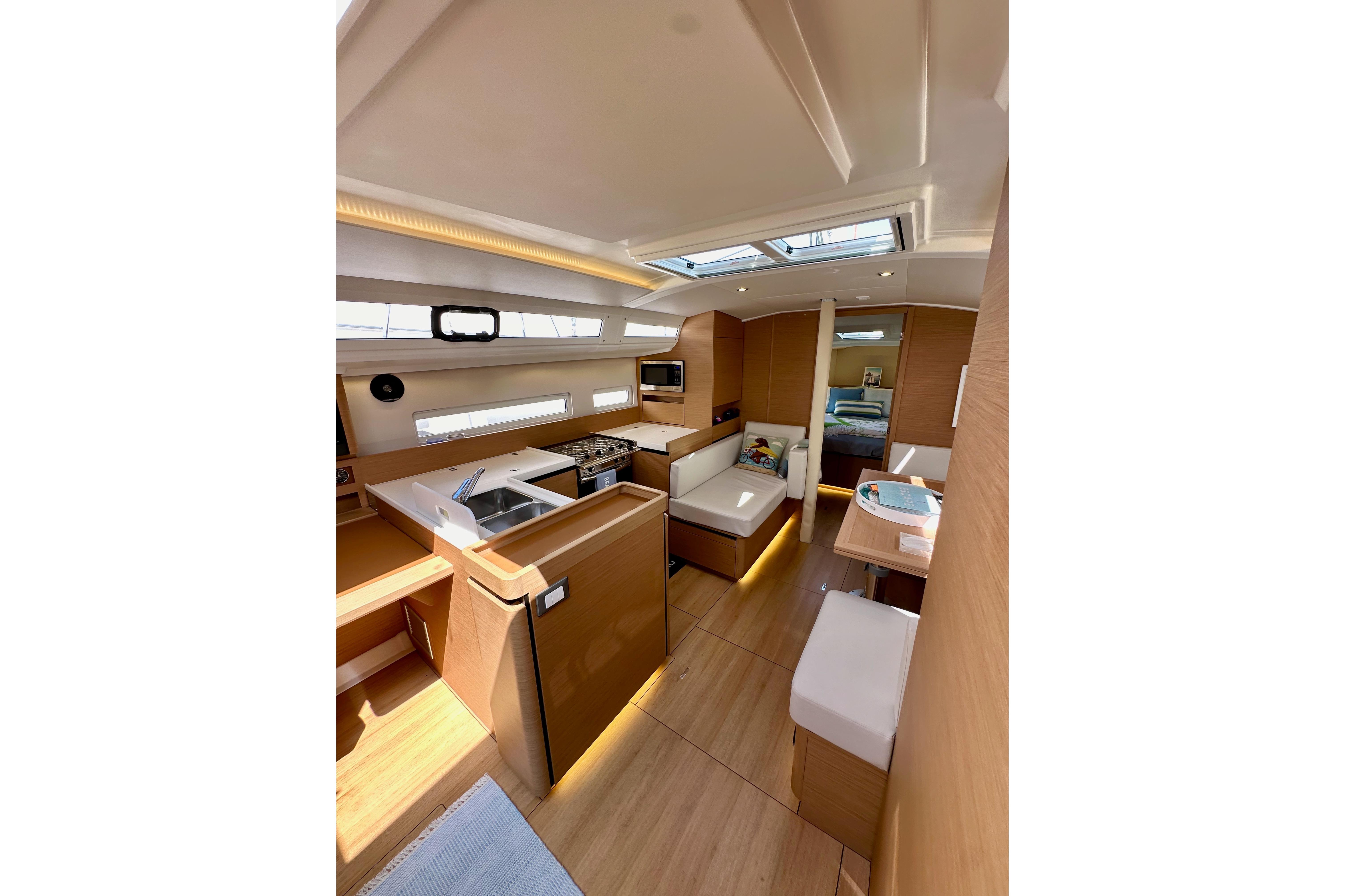 Interior of 2024 Jeanneau Sun Odyssey 410 sailboat, featuring modern design and spacious layout.
