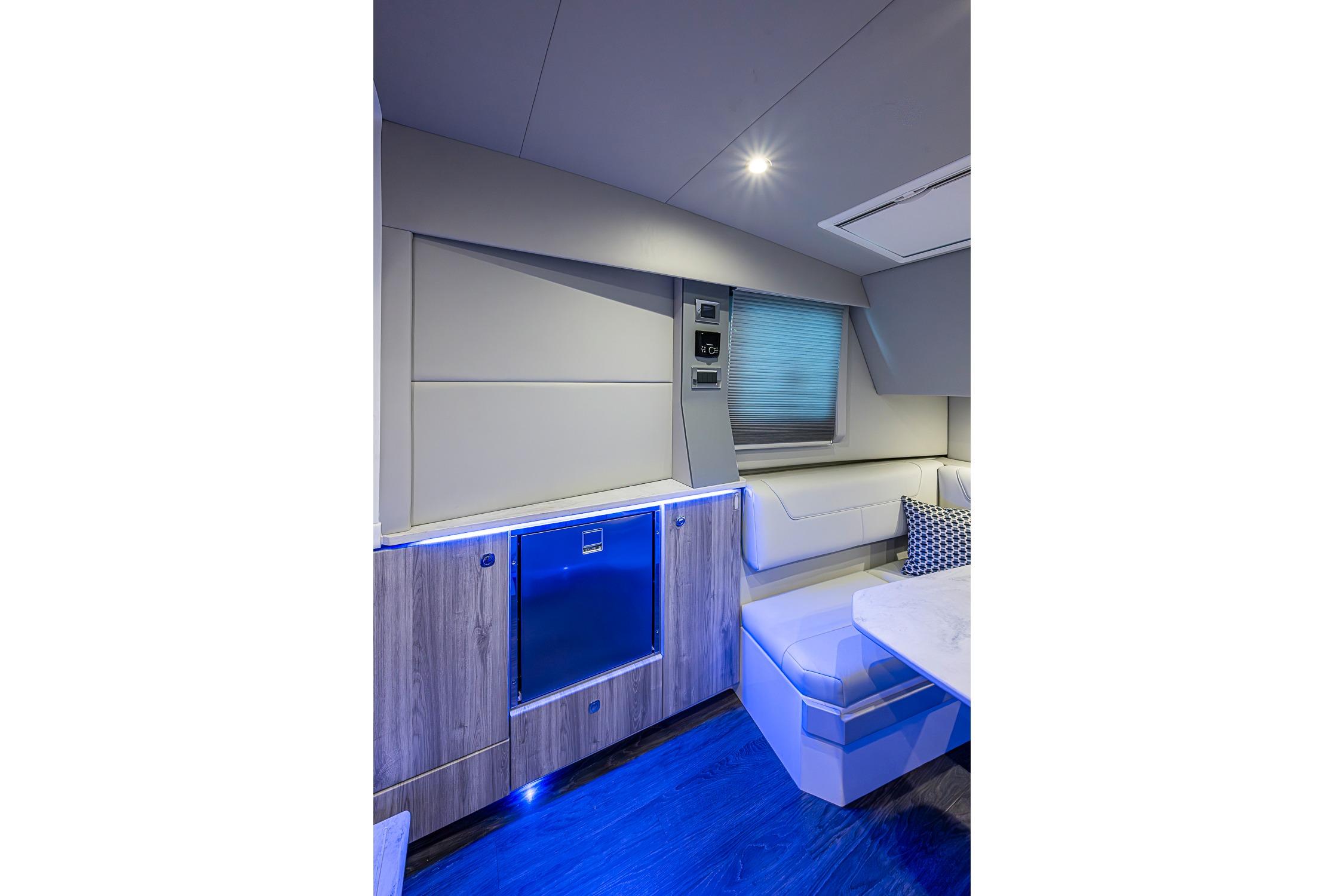 Luxurious interior of 2024 Formula 400 Super Sport Crossover with modern seating and ambient lighting.