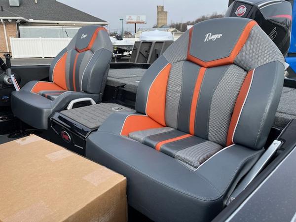 2025 Ranger Z520 boat seats with gray and orange design, parked outdoors.