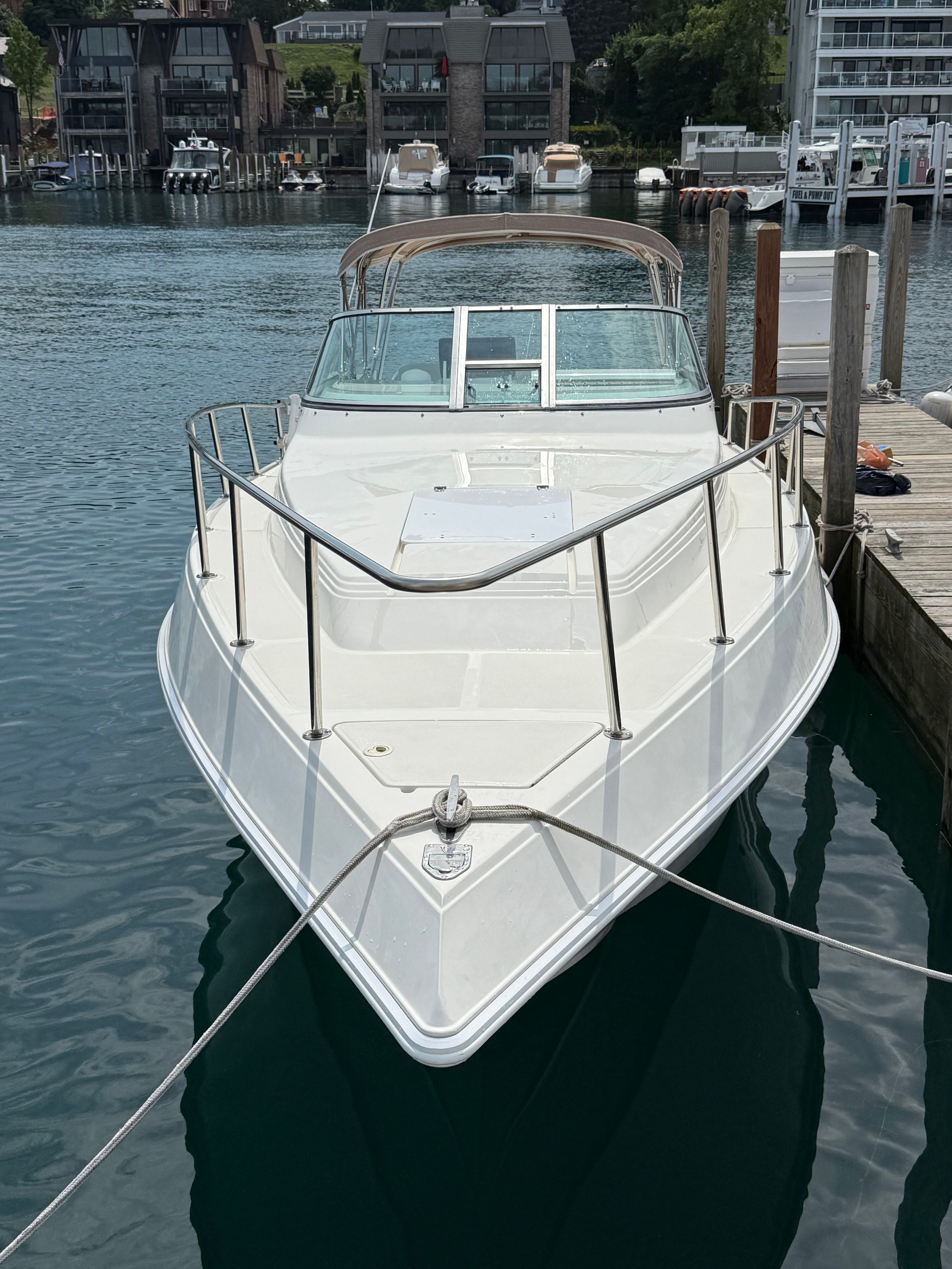 1999 Fountain 32 Sport Fish Cruiser at the dock.