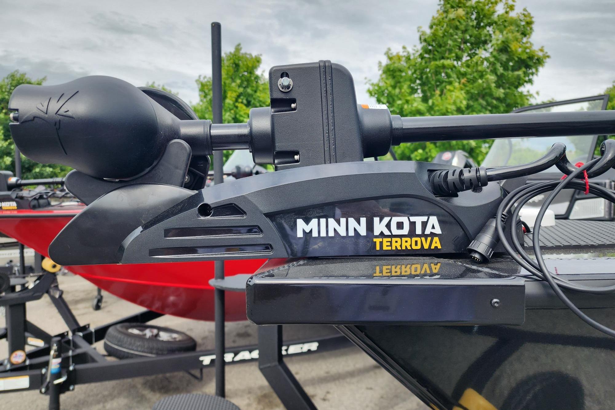 Minn Kota Terrova motor on 2026 Ranger VX1788 WT boat, outdoors with trees in background.