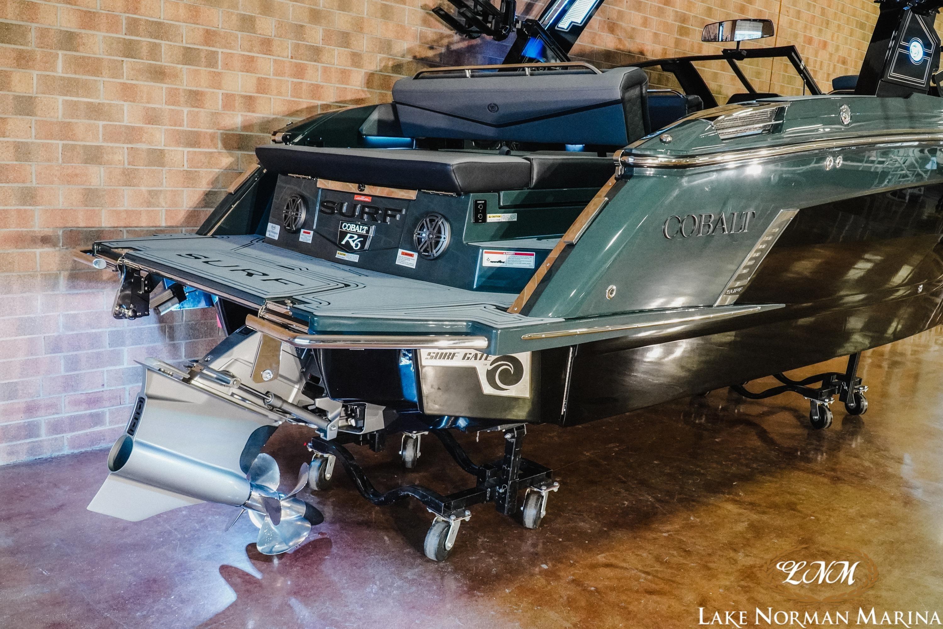 2026 Cobalt R6 Surf boat displayed indoors at Lake Norman Marina.