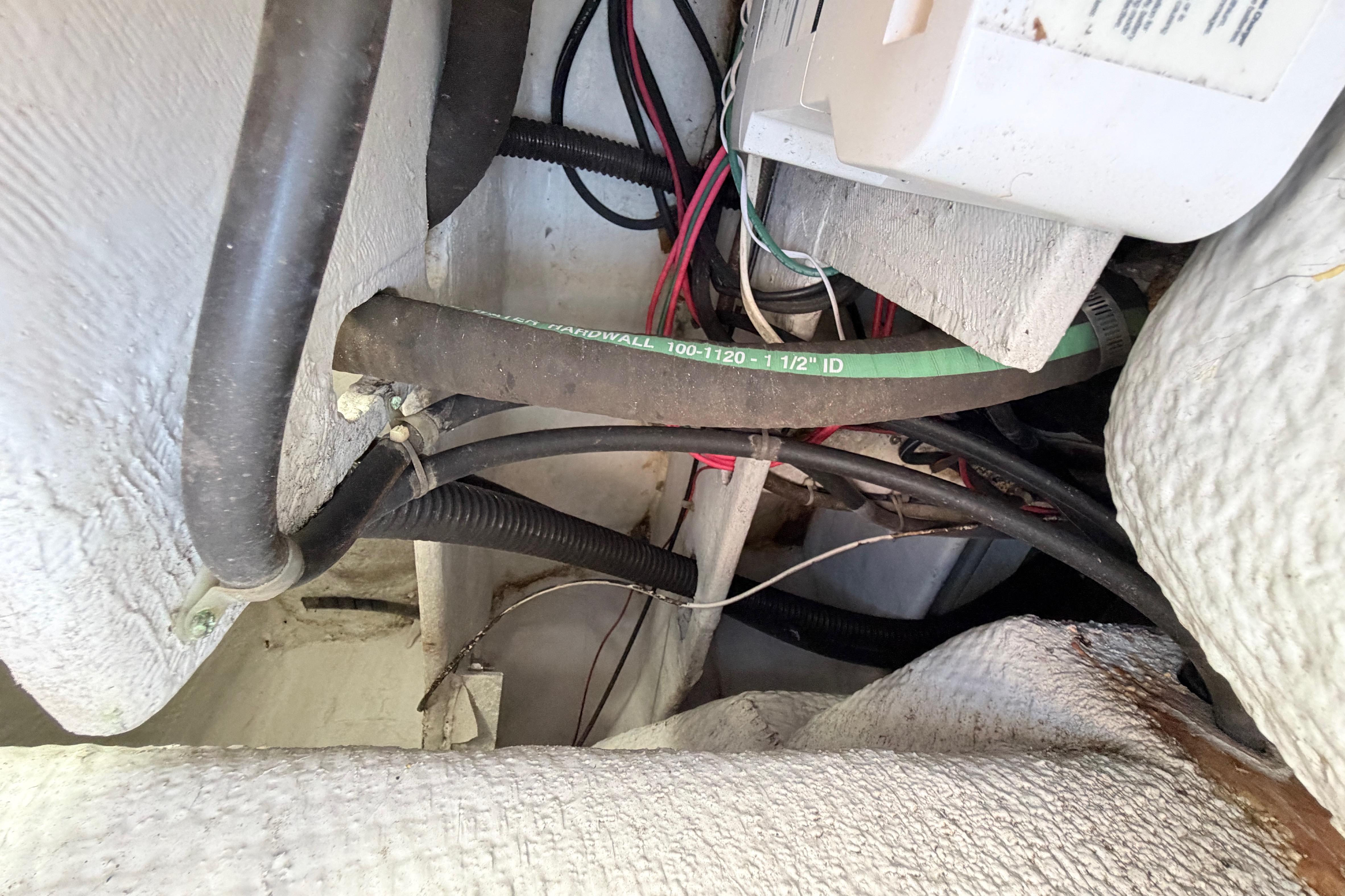 2006 Grady-White Sailfish 282 boat wiring and plumbing details in engine compartment.