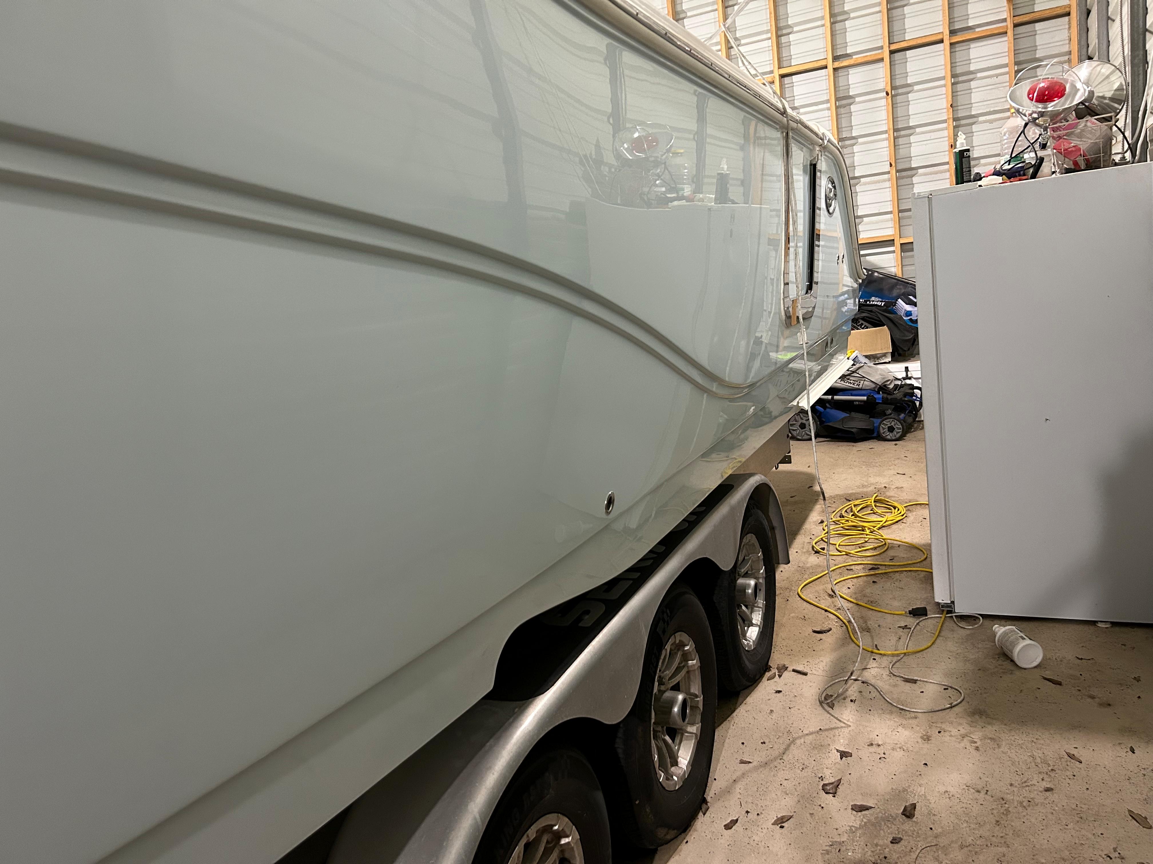 2019 Sea Fox 328 Commander boat on trailer in storage facility.