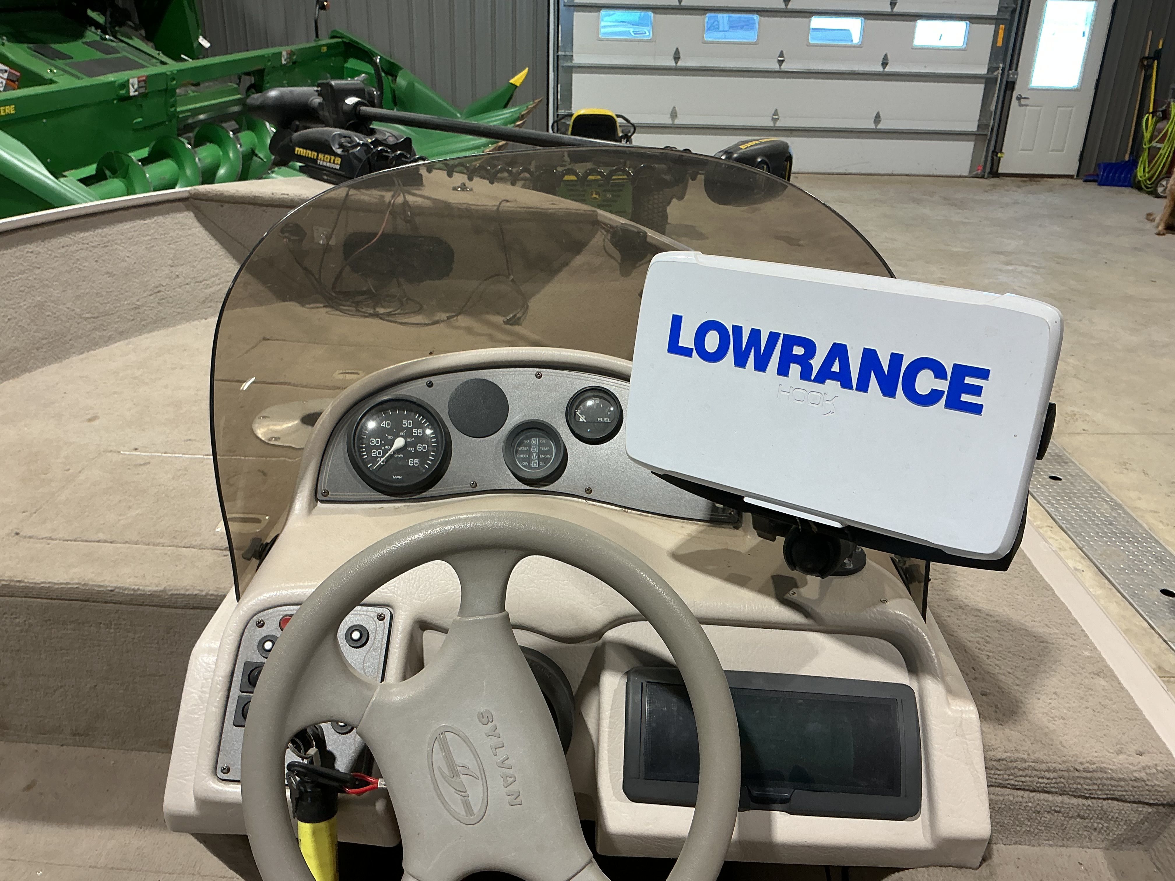 Sylvan EXPEDITION 1999 boat console with Lowrance GPS.