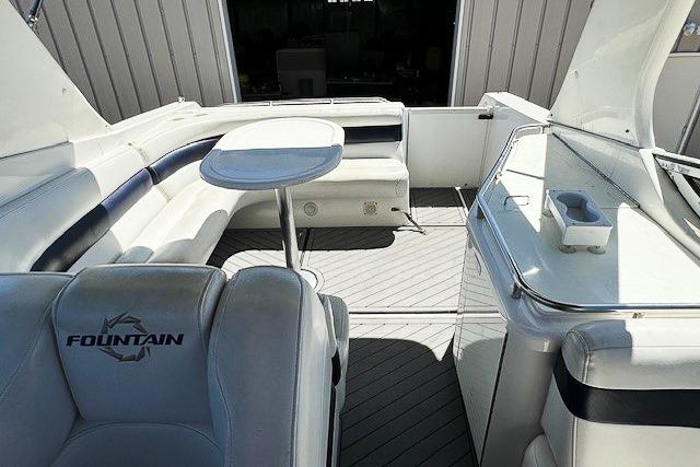 2007 Fountain 38 Express Cruiser interior with seating and table.