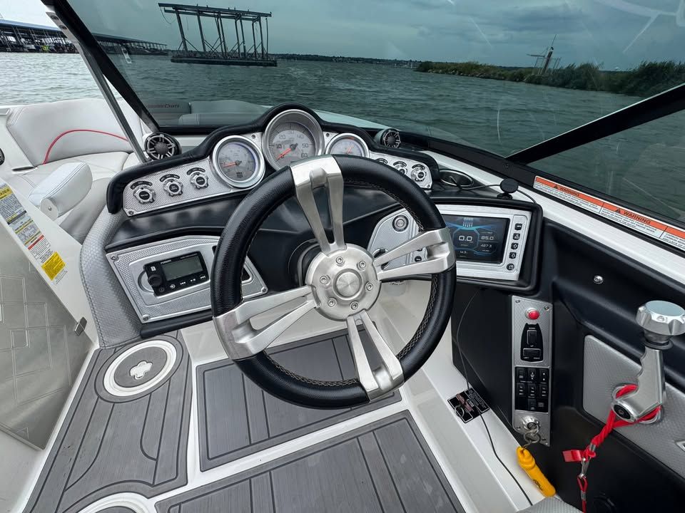 Interior view of a 2015 MasterCraft X46 boat with controls.