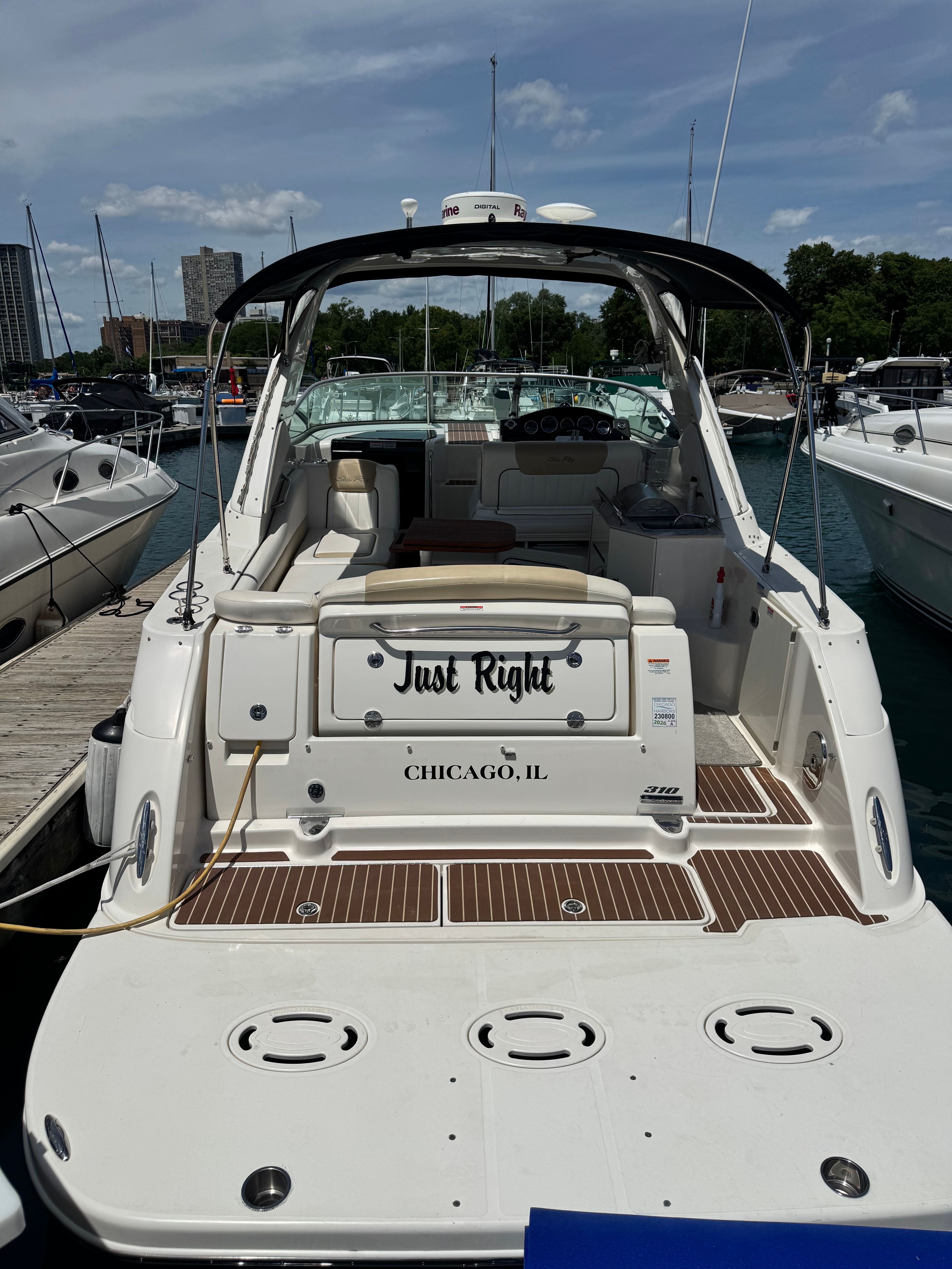A 2010 Sea Ray Sundancer 310 docked in Chicago harbor.