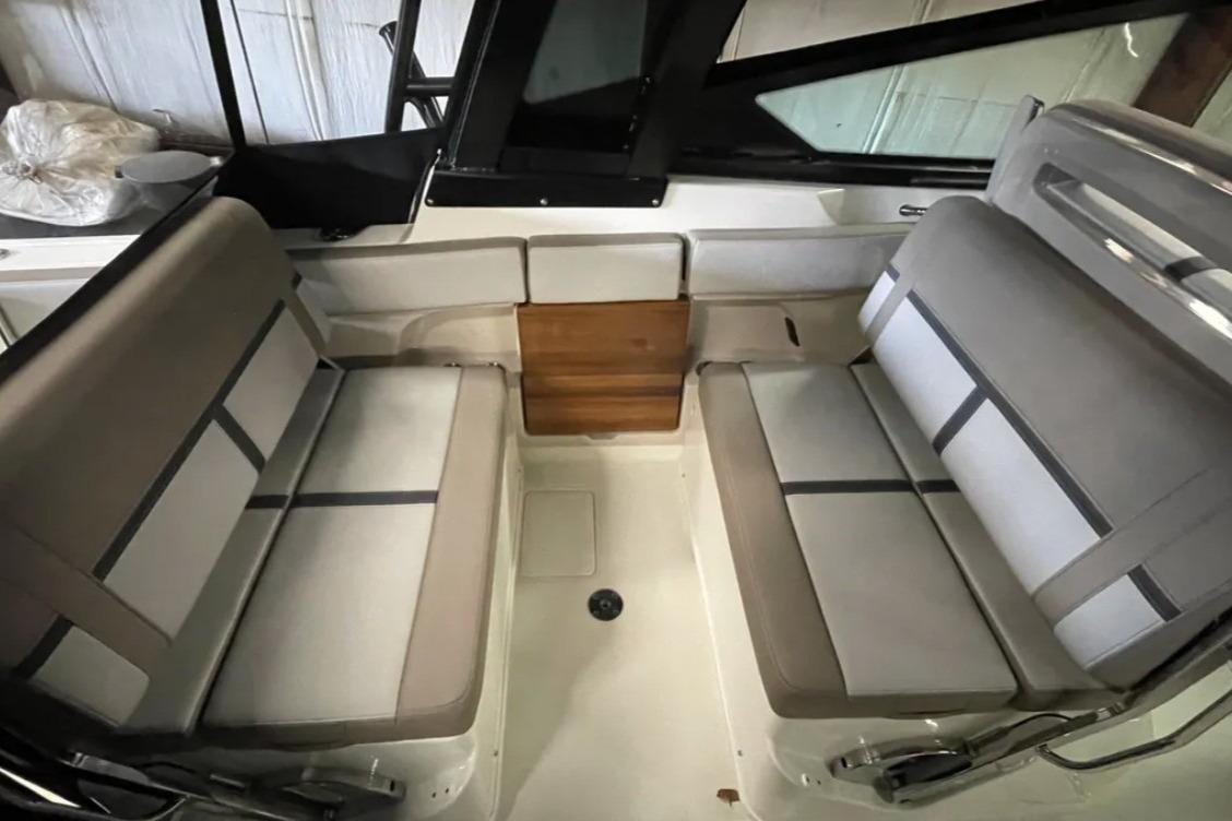 2025 Boston Whaler 330 Vantage interior seating, featuring modern design and comfortable upholstery.