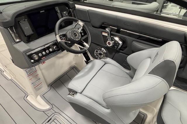 2026 Chaparral SSX 8 boat cockpit with modern steering and controls.