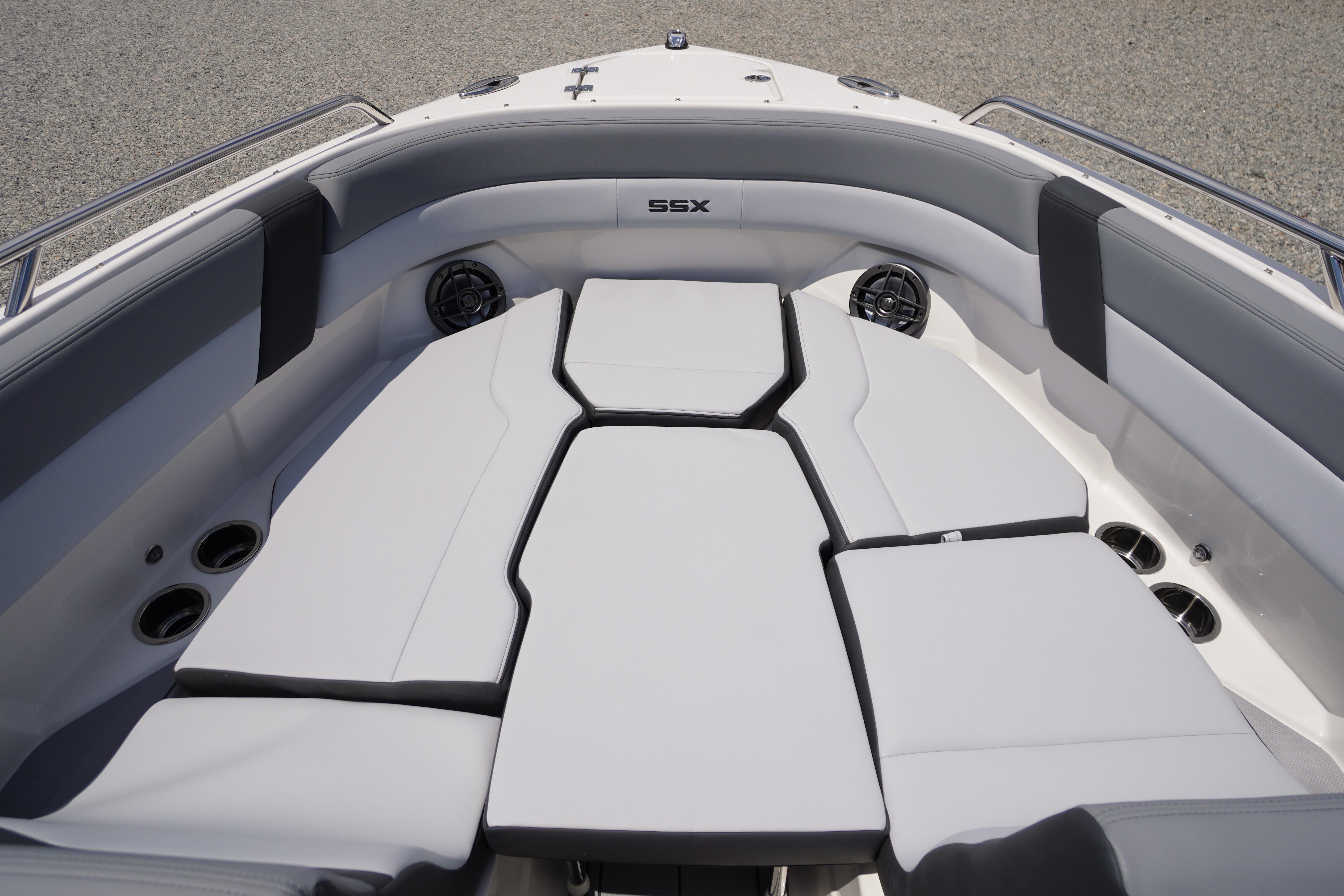2026 Chaparral SSX 4 boat interior with cushioned seating and cup holders.