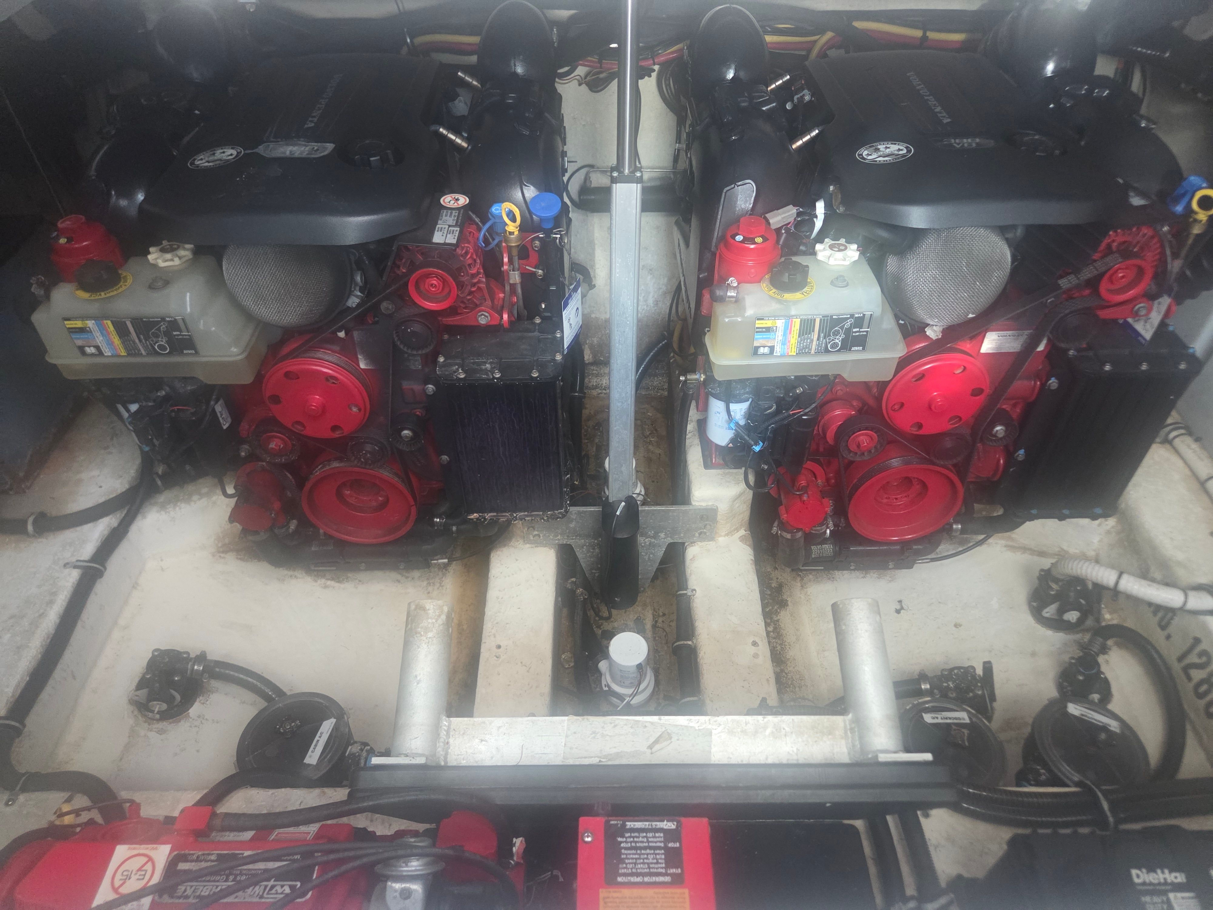 Engine compartment of a 2019 Monterey 360SC boat with dual engines.