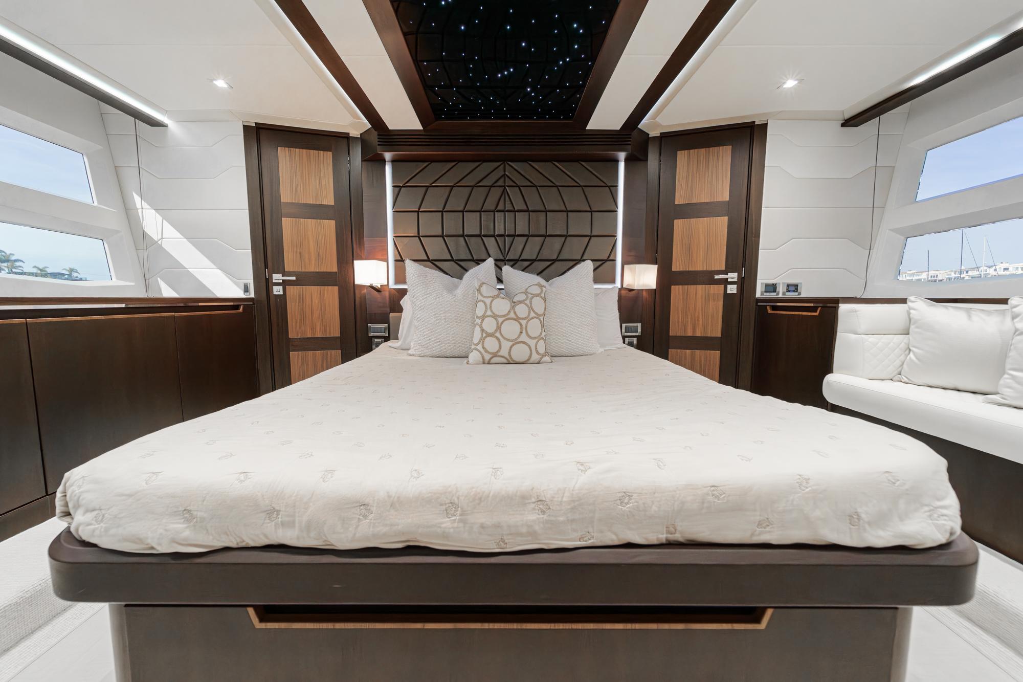 Luxurious bedroom on the 2016 Galeon 640 Fly yacht.