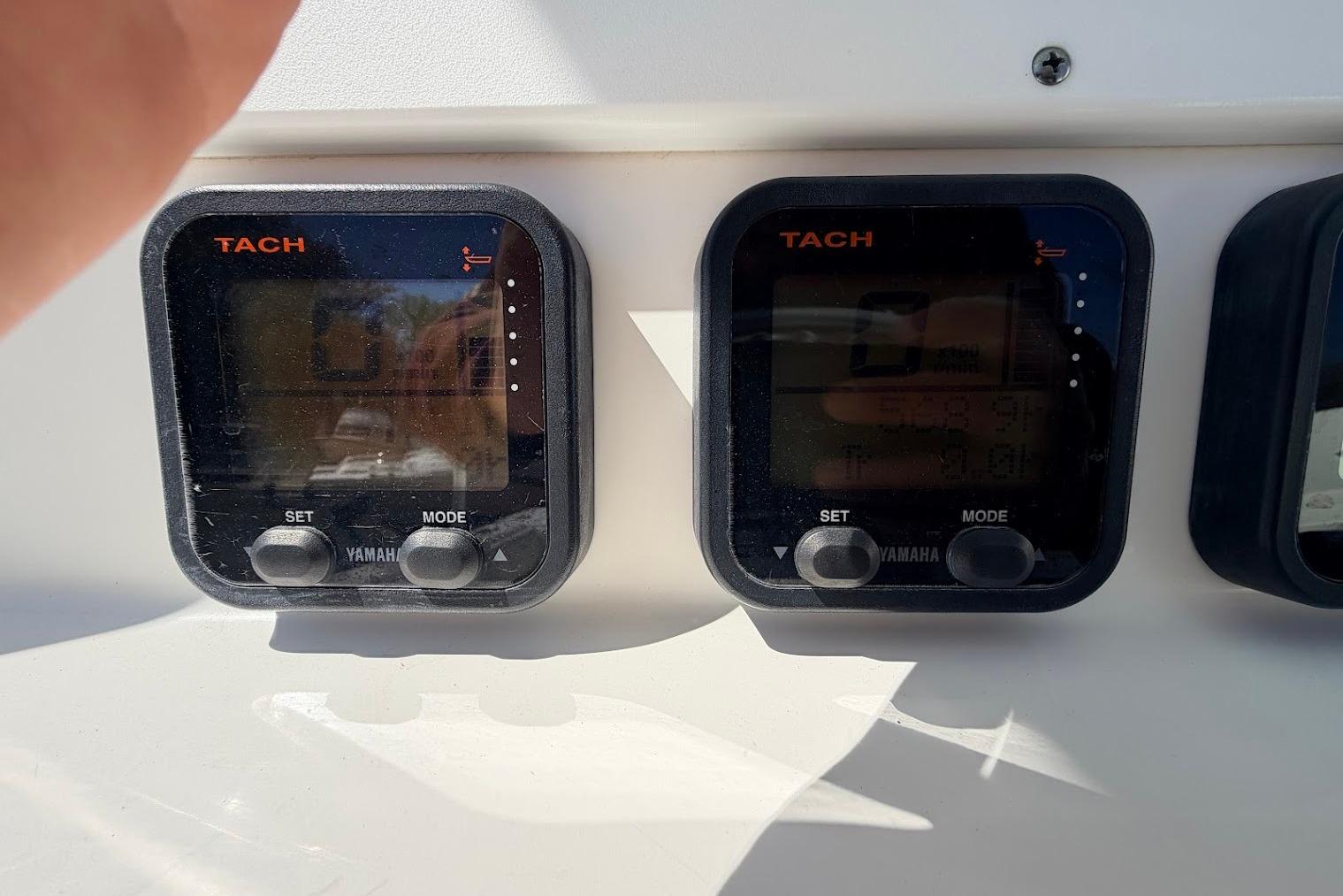 Yamaha tachometers on a 2006 Regulator 29 Forward Seating boat dashboard.