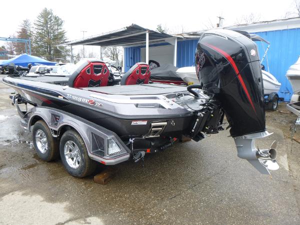 2025 Ranger Z519R Cup-Equipped boat with powerful outboard motor, parked on a trailer.