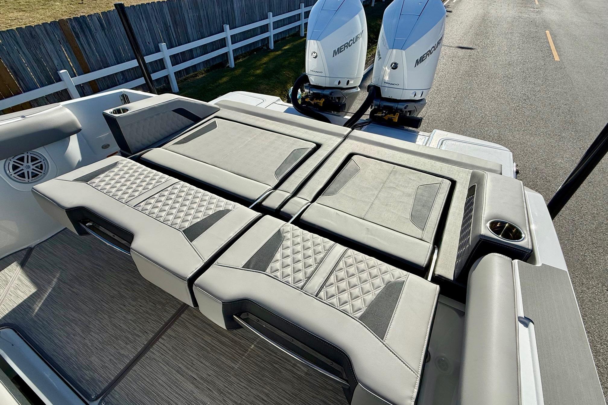 2026 Monterey Elite 30 OB boat with luxurious seating area.