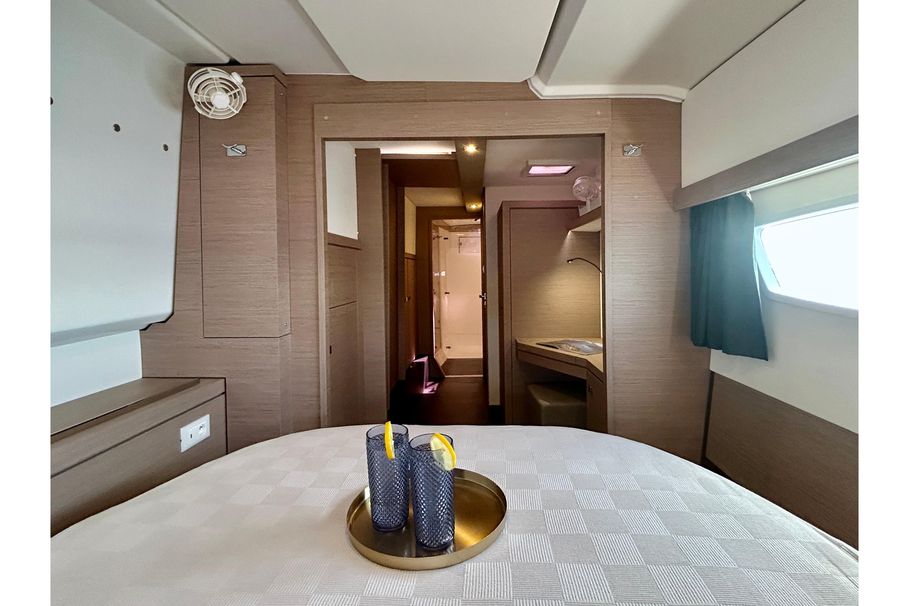 Luxurious interior of 2021 Fountaine Pajot Isla 40 catamaran cabin with modern amenities.