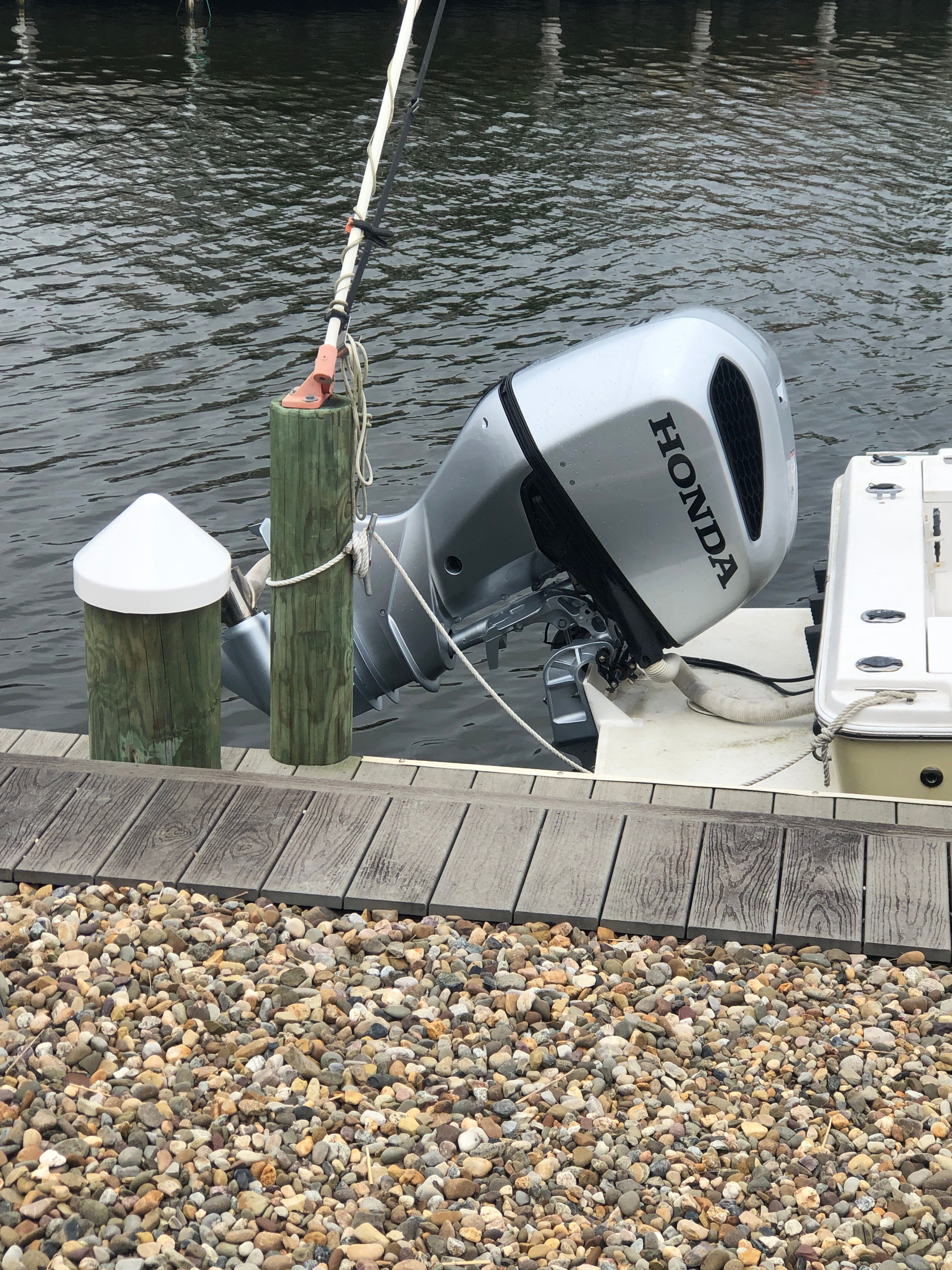 Honda outboard motor on a 2003 Sea Pro 235 Center Console boat.