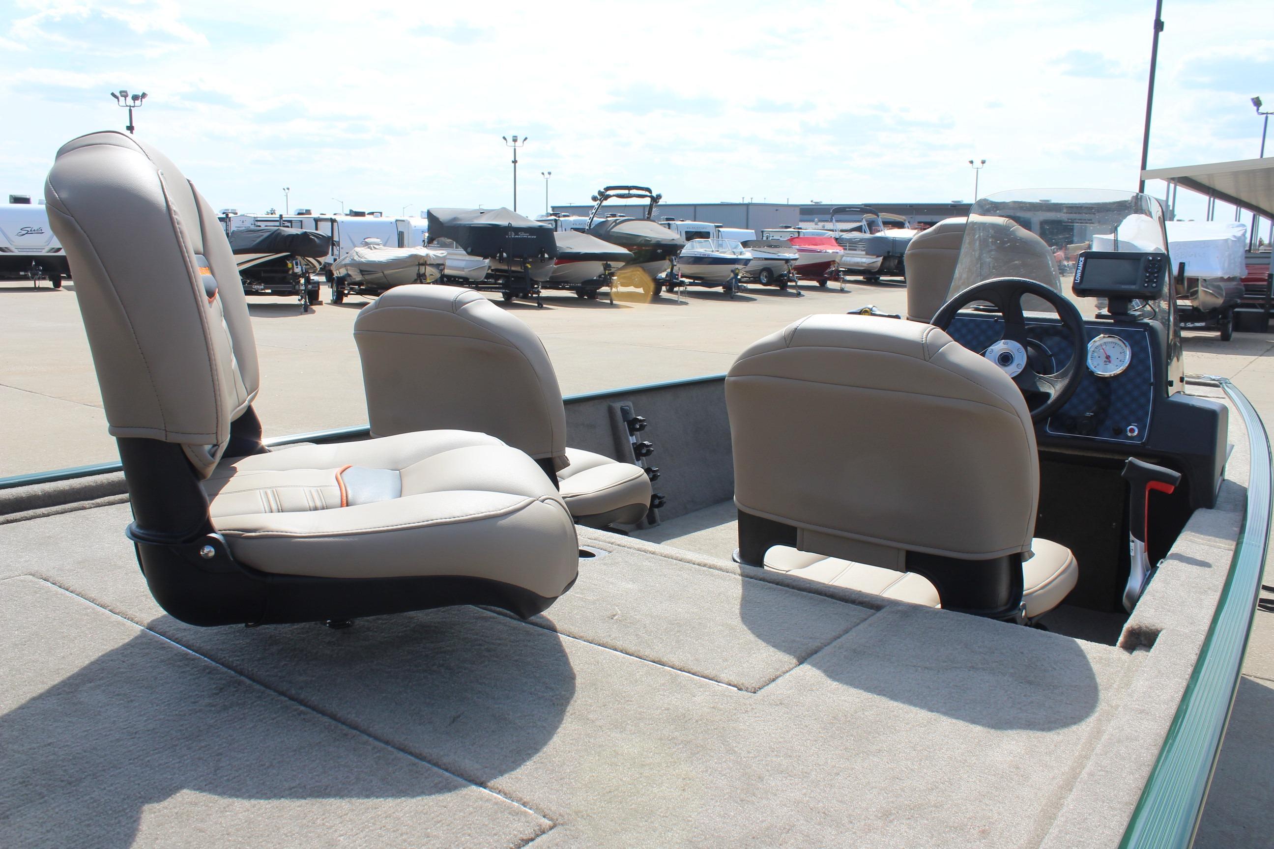 2026 Tracker Bass Tracker Classic Limited boat interior with seating and dashboard view.